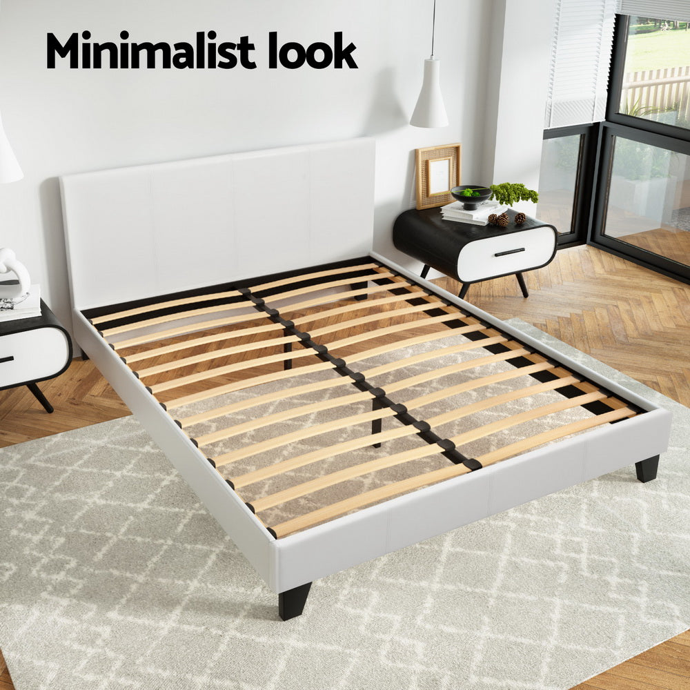 Coogee Queen Bed Frame White with minimalist upholstered headboard and wooden slats in a modern bedroom setting