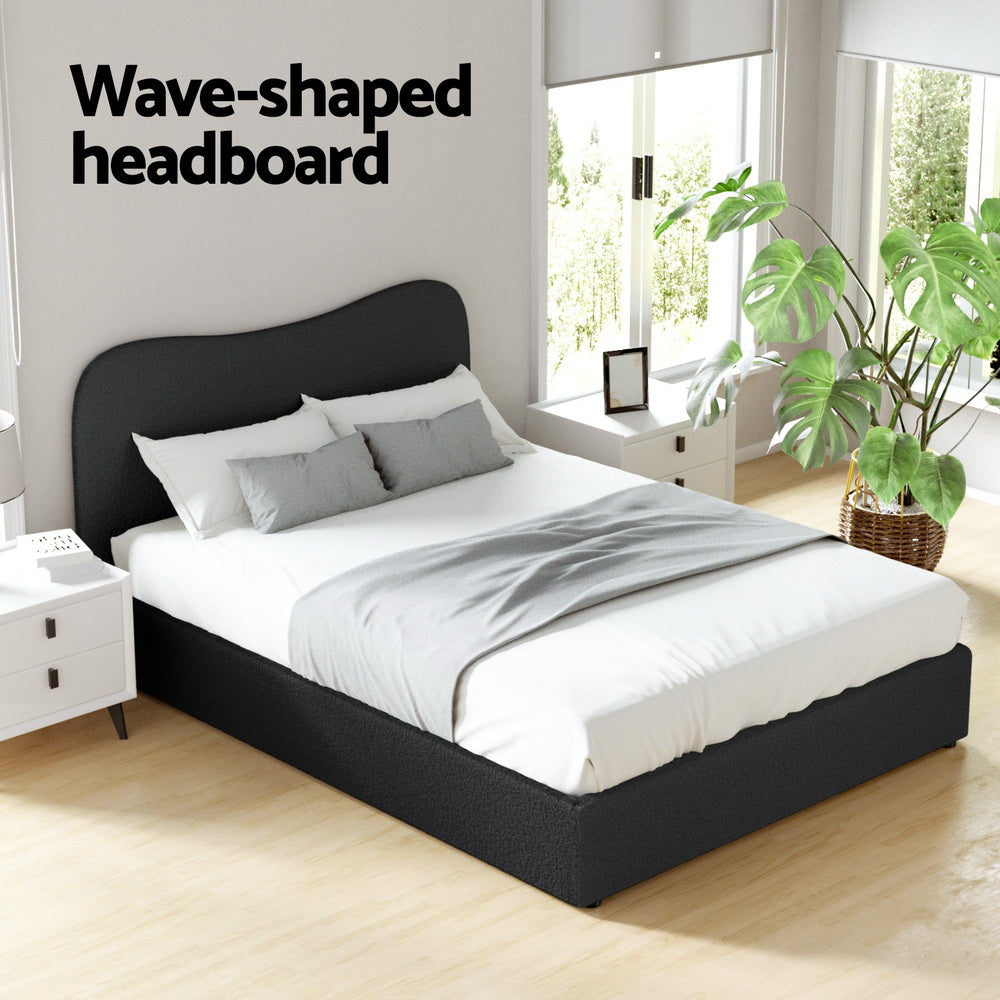 Albany Bouclé Double Bed Frame - Black with wave-shaped headboard in a bright bedroom setting with white bedding and side tables