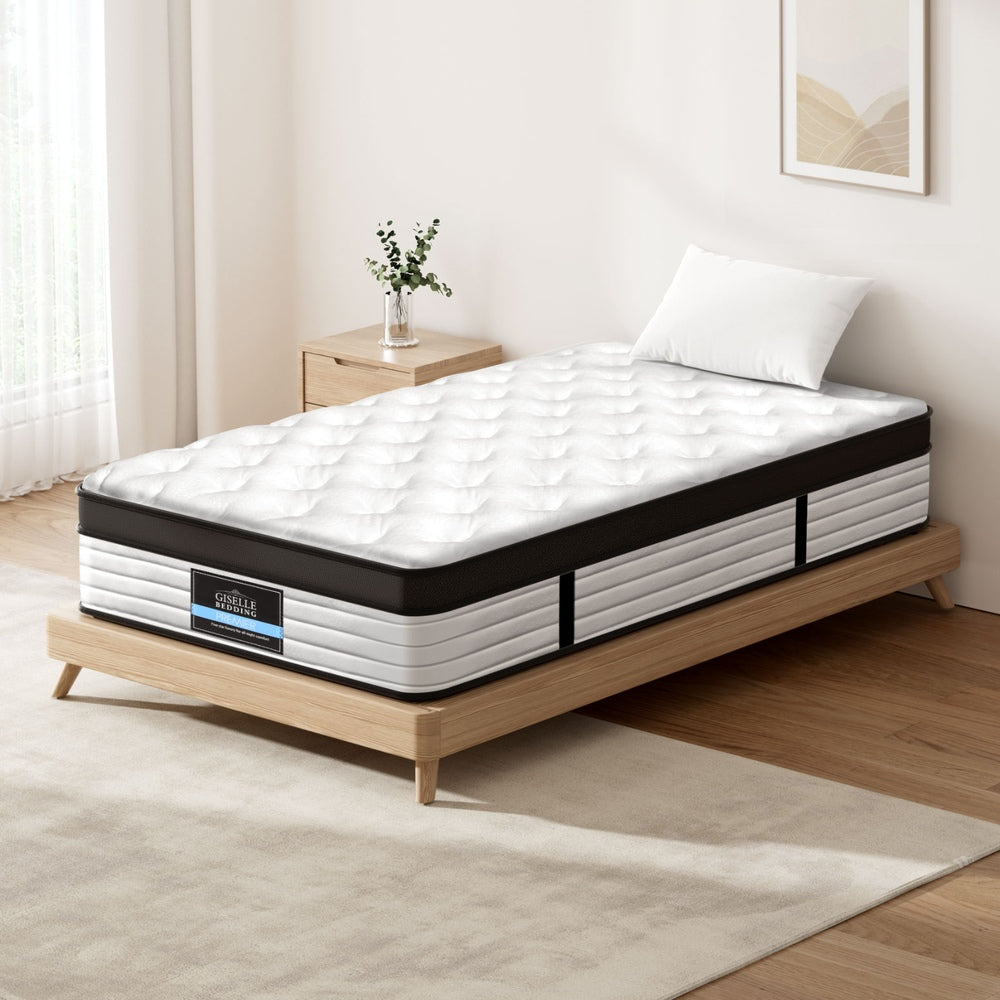 Devon Euro Top Pocket Spring Mattress 31cm Thick - King Single on wooden bed frame in minimalist bedroom setting