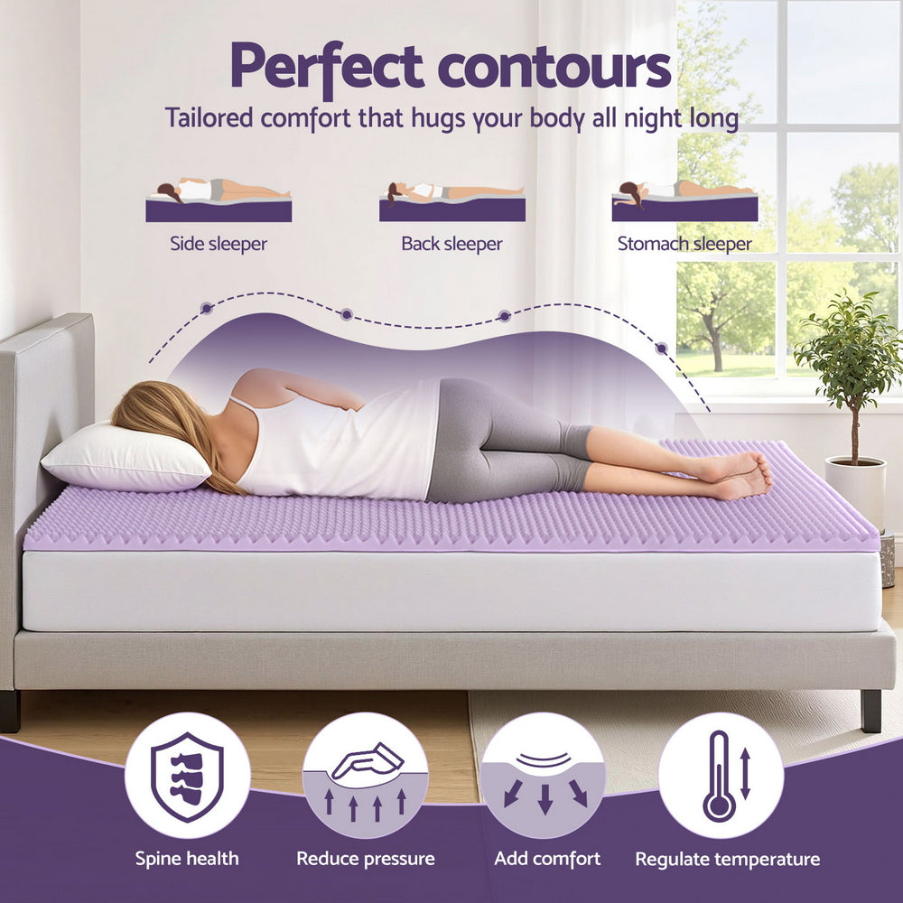 Woman lying on bed with 5cm Memory Foam Mattress Topper Lavender Infused Egg Crate Pad Mat Queen showing perfect contours and comfort benefits