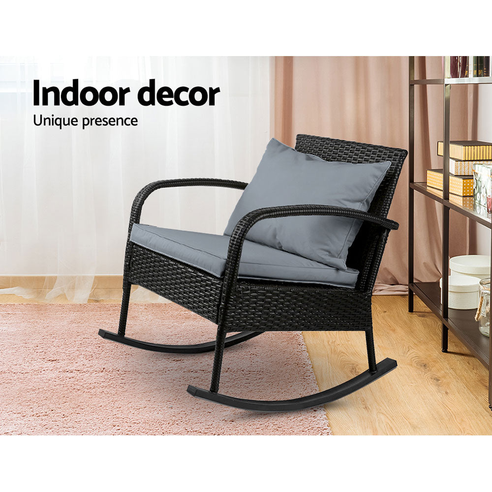 Outdoor Furniture Rocking Chair Wicker Garden Patio Lounge Setting Black with gray cushions on wooden floor and carpet