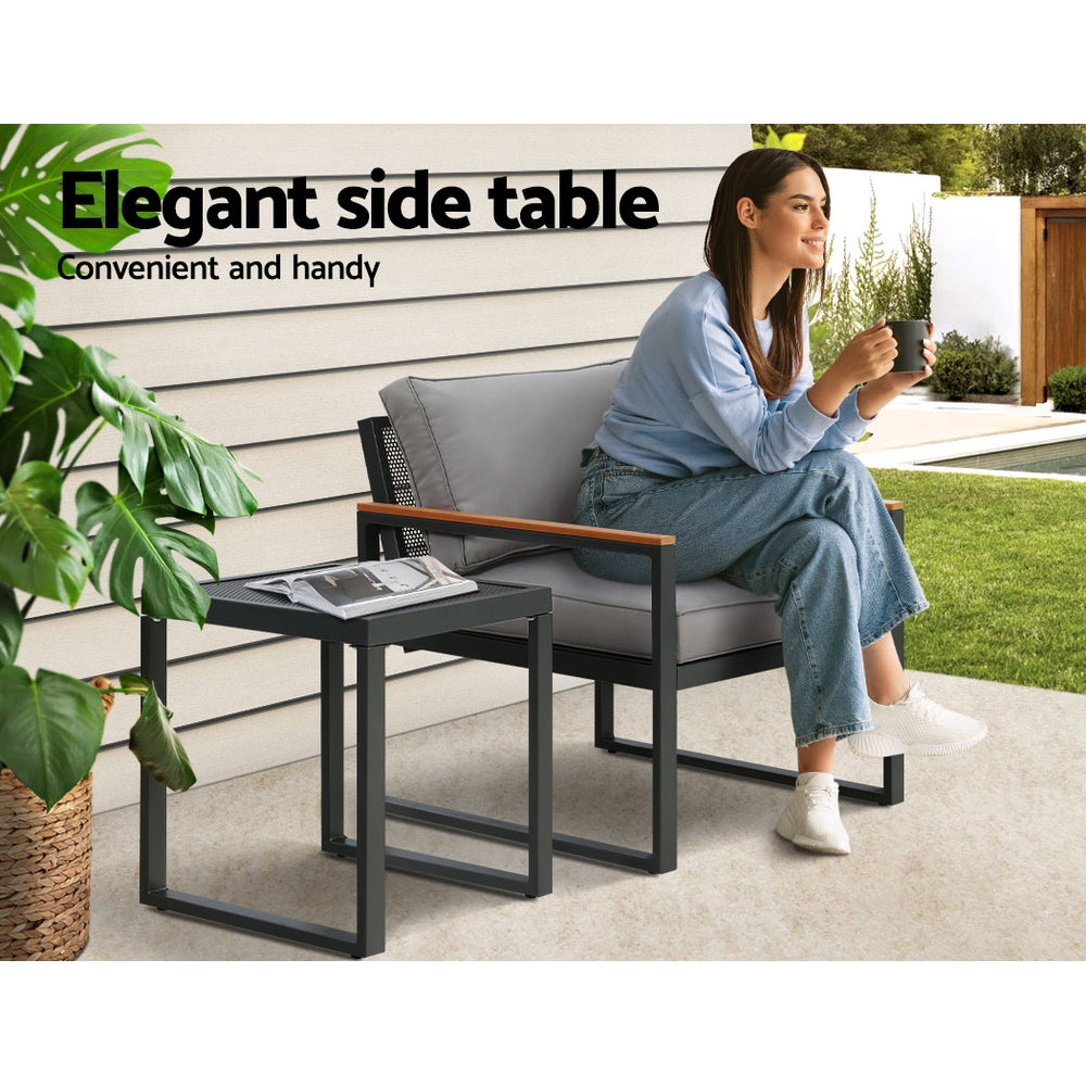3 Seater Corner Steel Modular Lounge Setting with cushioned single seat and black steel side table outdoors