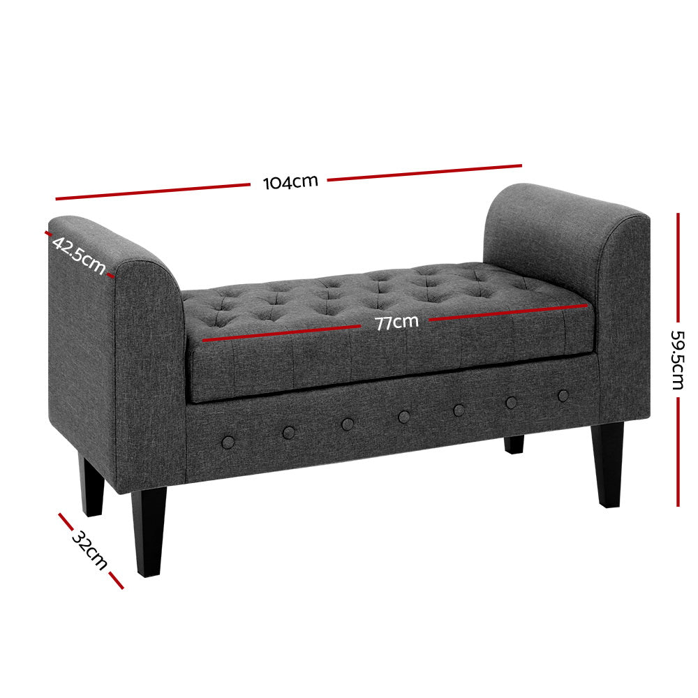 Fabric Storage Ottoman - Grey with tufted seat, curved armrests, and wooden legs, suitable for bedroom furniture and storage.