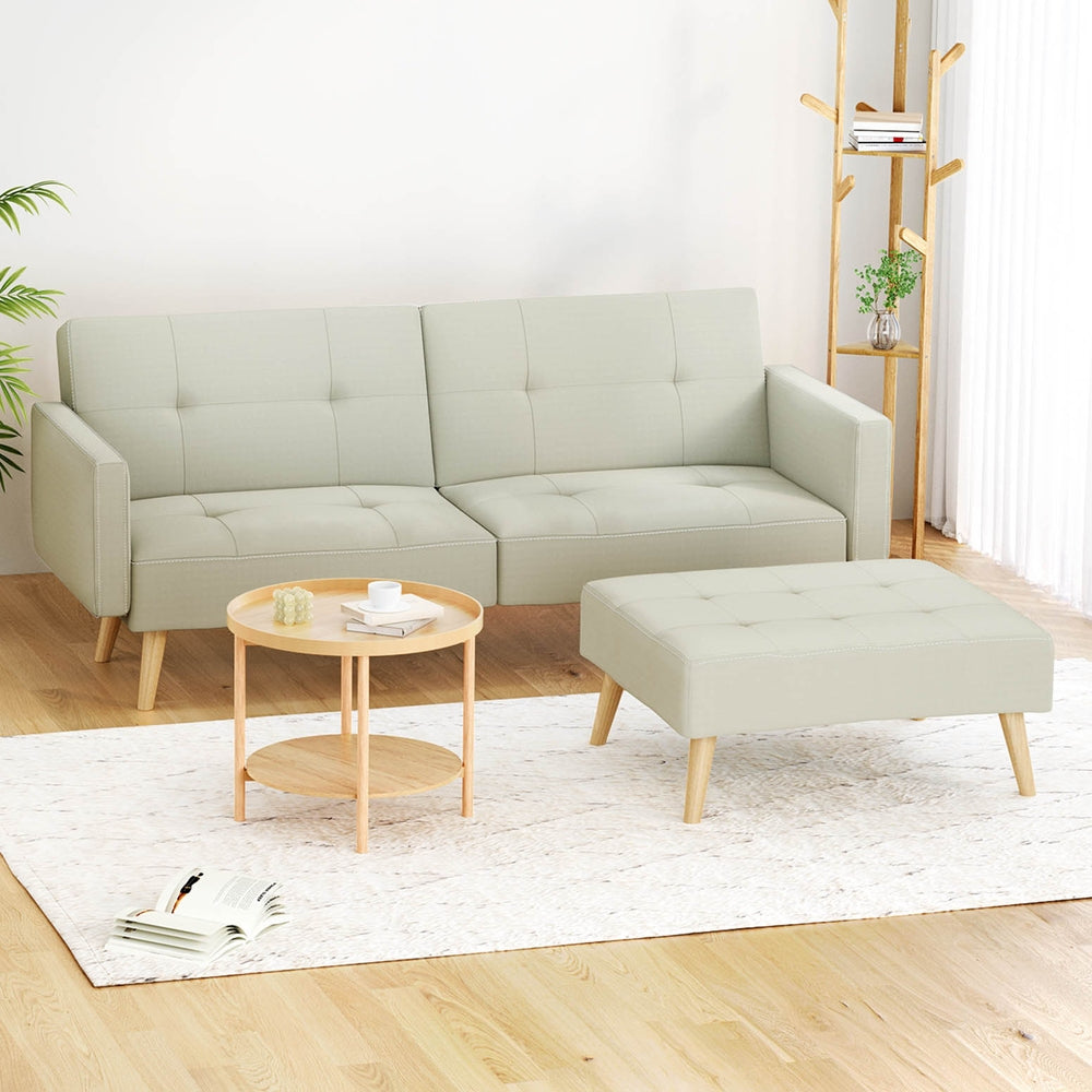 Sofa Bed Ottoman 200CM Beige Faux Linen with tufted cushions and wooden legs in modern living room setting