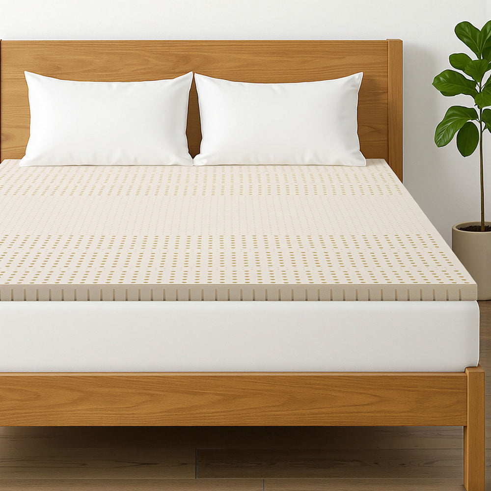 Bedding Latex Mattress Topper 5cm King on wooden bed frame with white pillows and green potted plant in bedroom