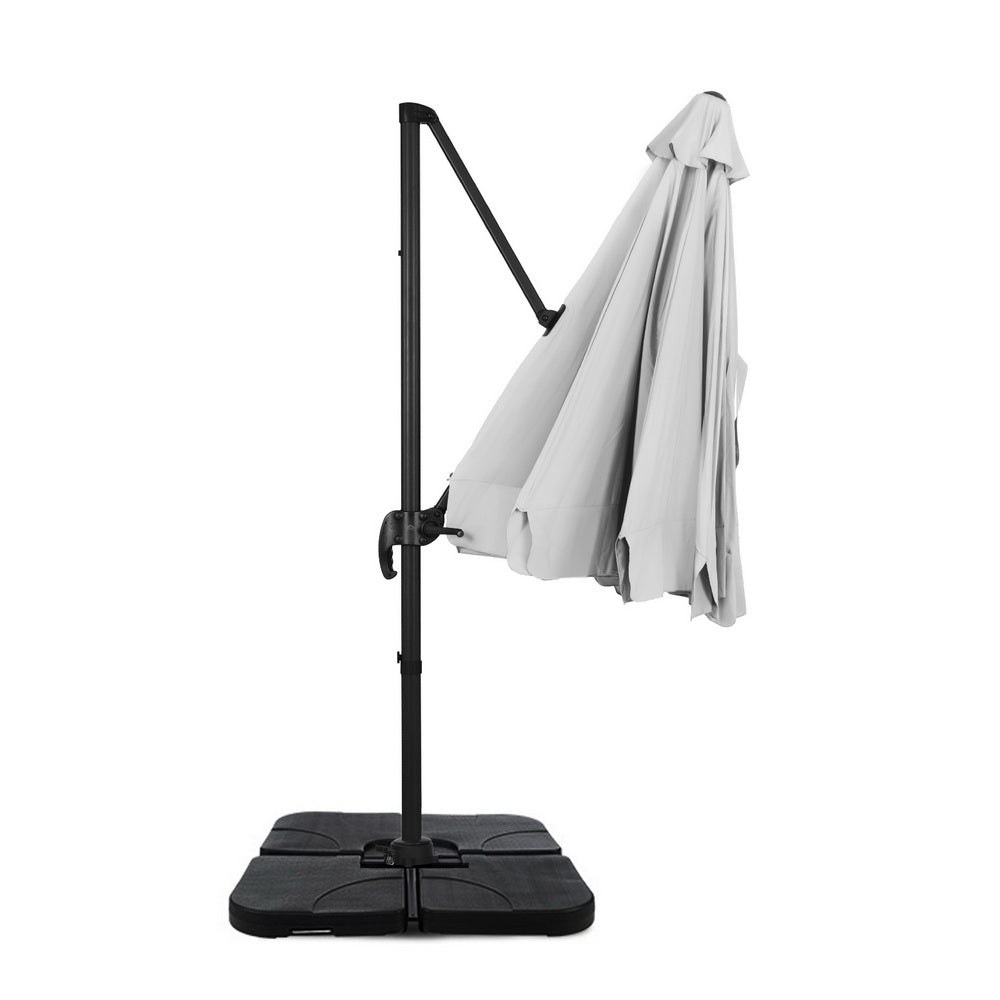 3m Outdoor Umbrella w/Base Cantilever Beach Roma 360 Degree Tilt Grey with sturdy black base and folded grey canopy on white background