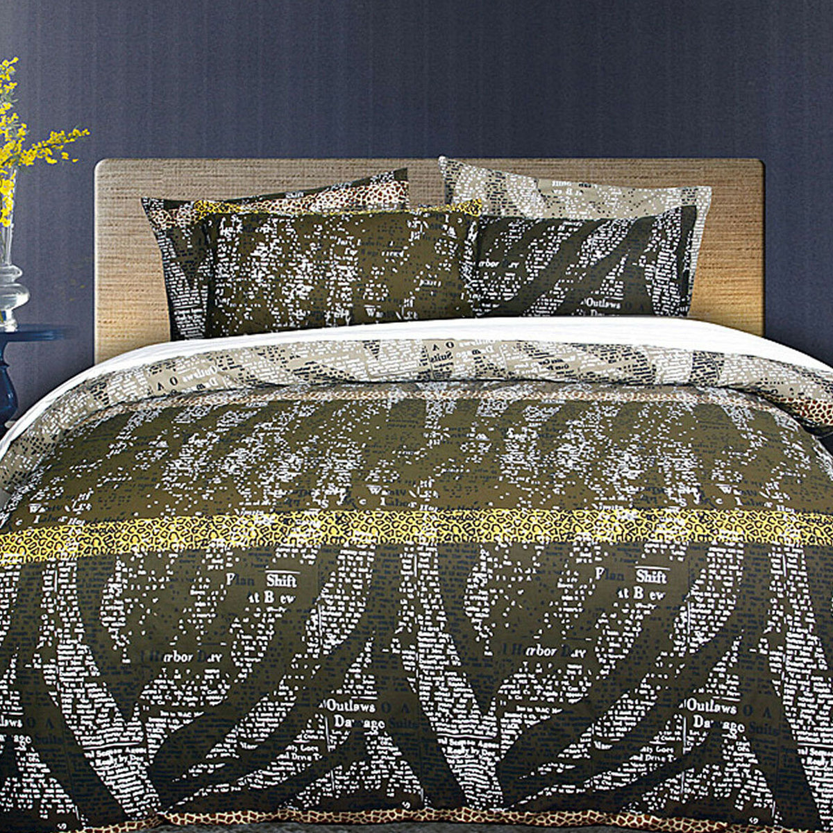 Zig Zag Quilt Cover Set Queen with patterned textile in black, brown, and white on a modern bed with wooden headboard