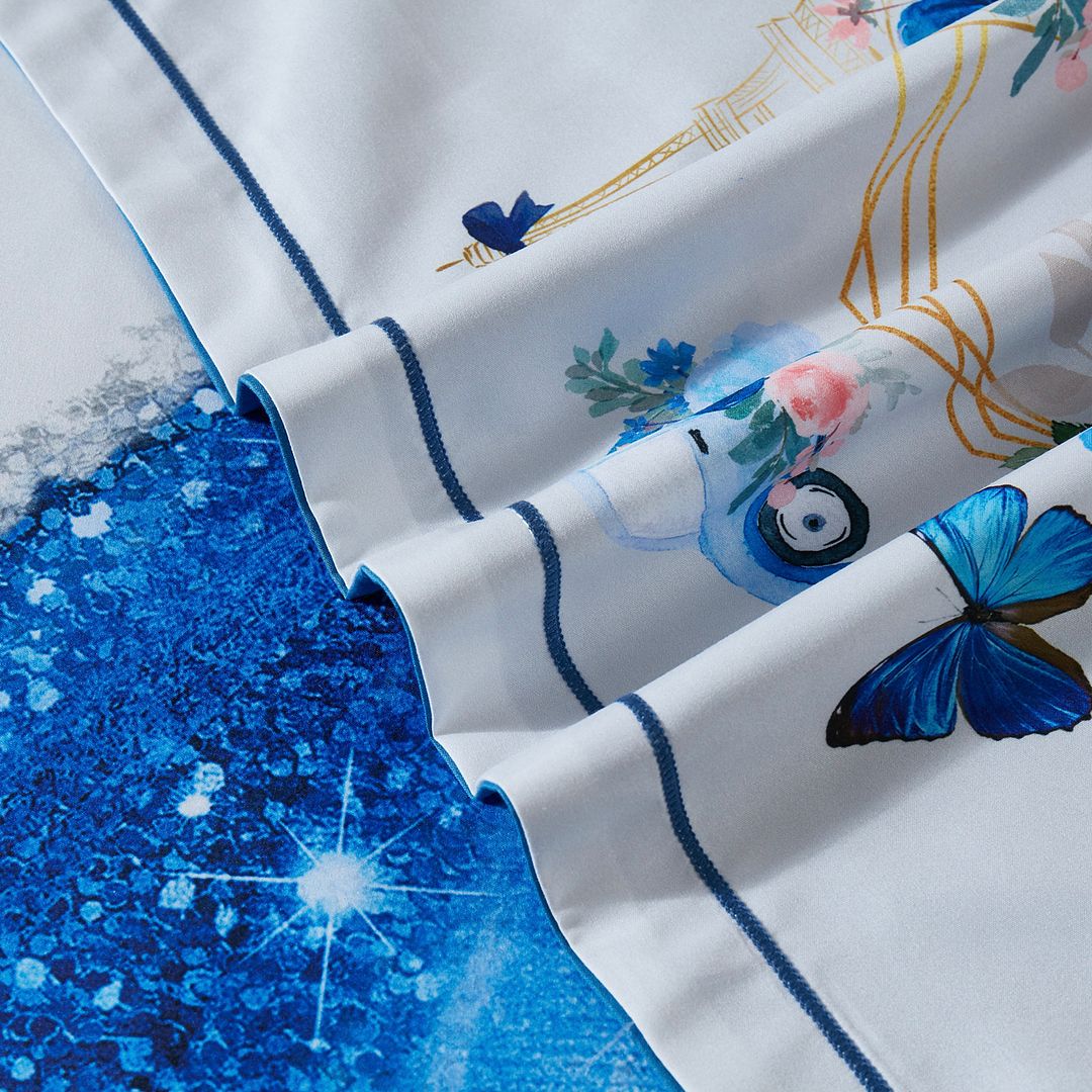Close-up of Princess Kids Quilt Cover Set - Single Size featuring whimsical blue and gold pattern with butterfly and floral details
