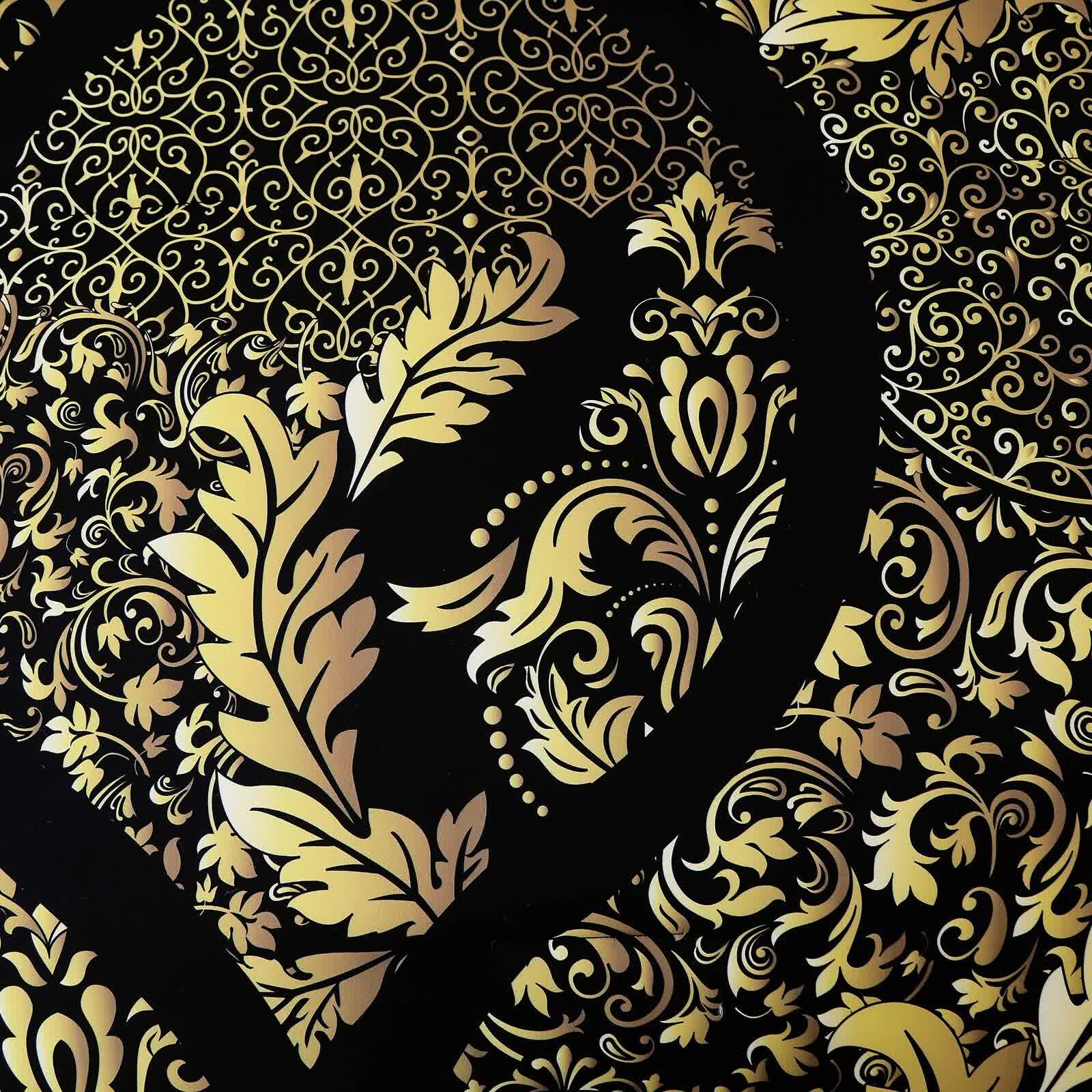 Close-up of ornate gold pattern on black fabric of Regal Elegance Black and Gold 3 Pc Comforter & Pillow Cover Set KING