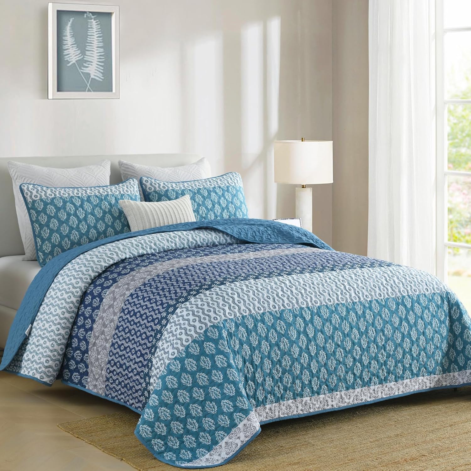 Classic Hydrangea Soft Quilted 3 Pc Bedspread & Pillow Cover Set on a bed in a bright bedroom with matching pillow covers