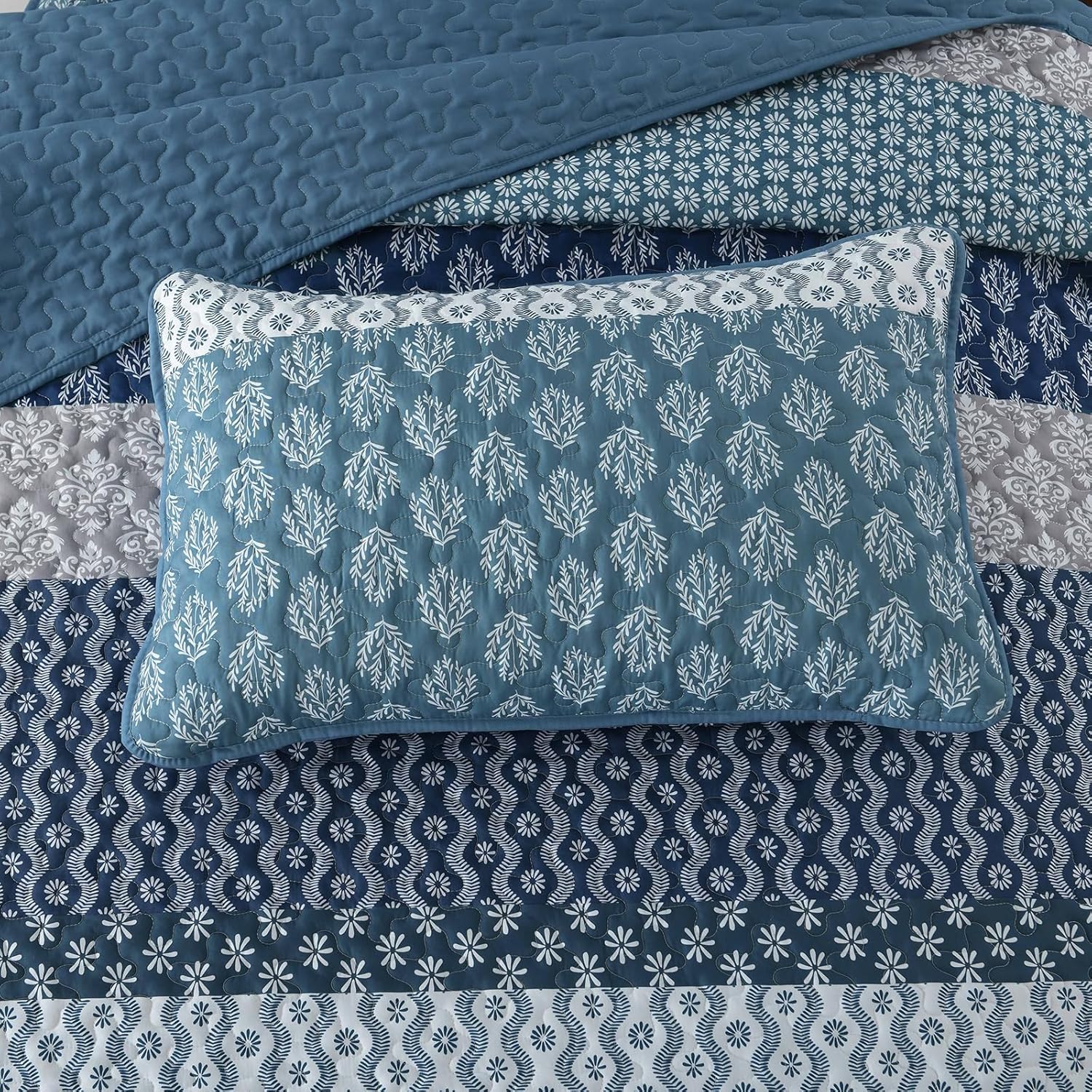 Classic Hydrangea Soft Quilted 3 Pc Bedspread & Pillow Cover Set with blue patterned quilt and matching pillow on bedzy bed