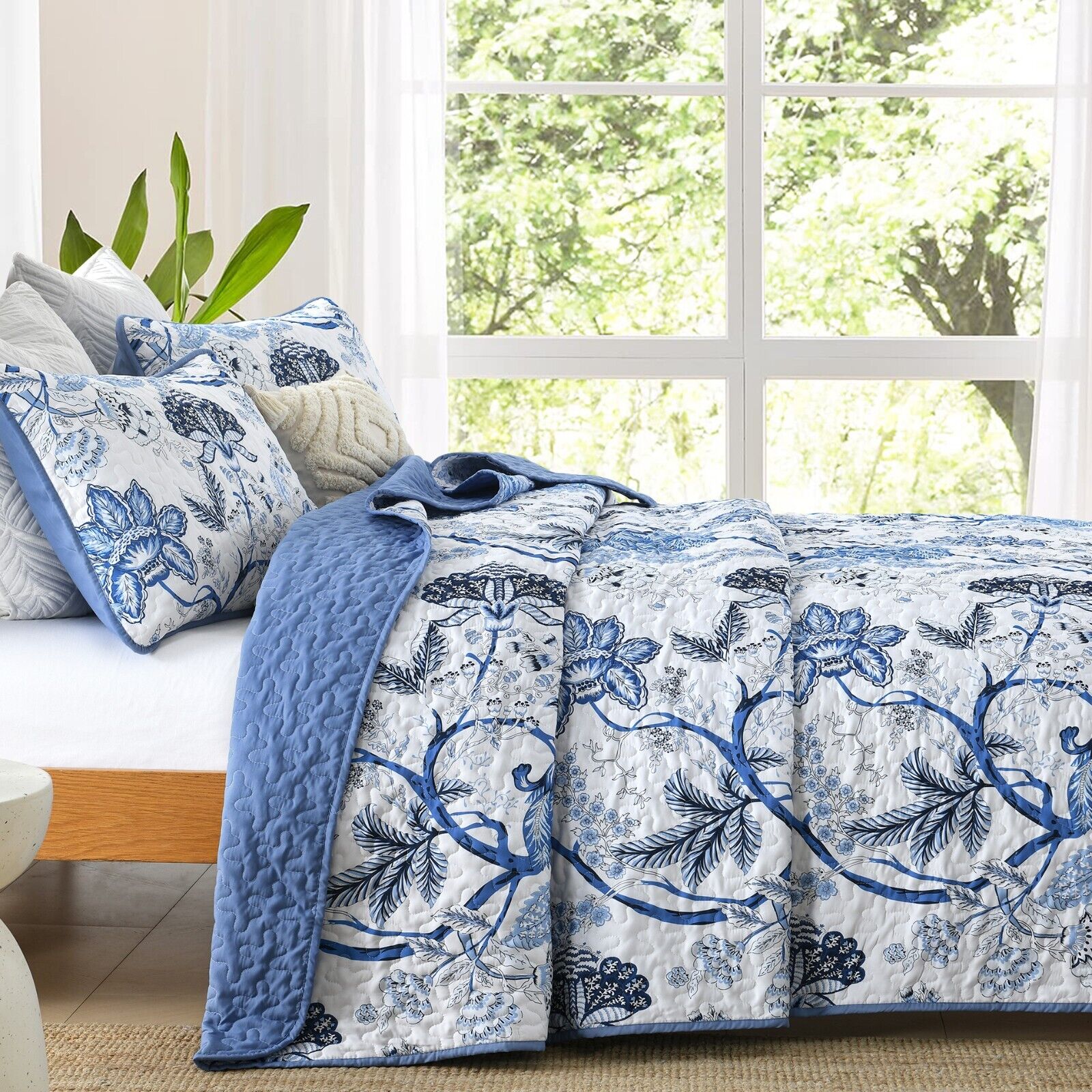 Blossoming Peony Garden blue white 3 Pc Bedspread & Pillow Cover Set on wooden bed with natural light and plant