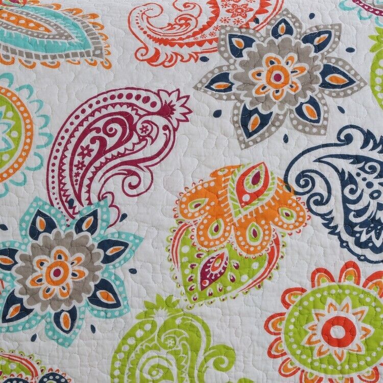 Close-up of Embroidered Regal Lily Pattern 3 Pc Bedspread & Pillow Cover Set featuring colorful floral and paisley designs on quilted fabric.