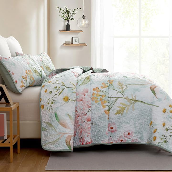 Opulent Sapphire bloom classy 3 Pc Bedspread & Pillow Cover Set with floral quilted design on bed in bright bedroom