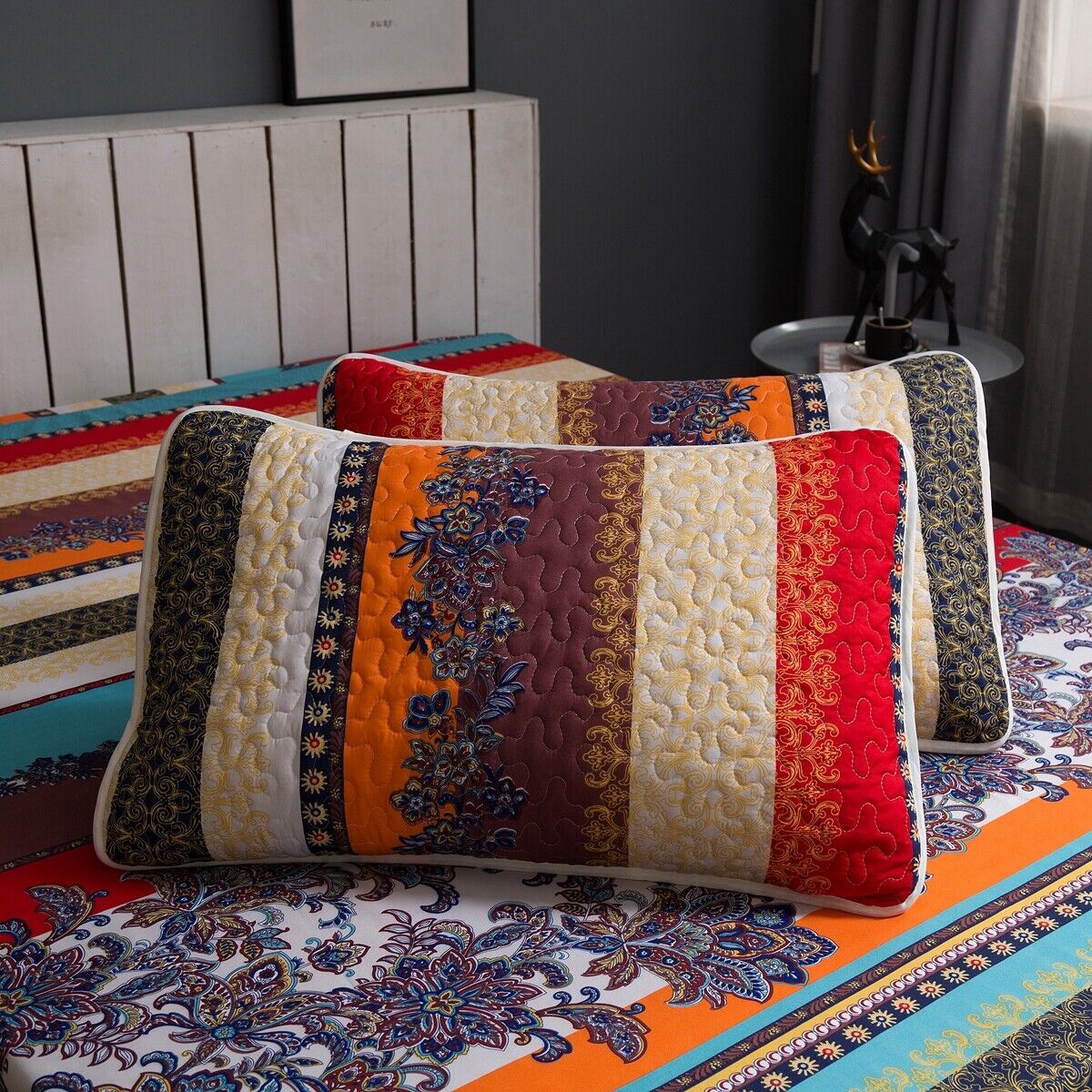 Rusty Boho floral Chic 3 Pc Bedspread & Pillow Cover Set with vibrant quilted patterns and decorative pillows on bedzy bed.