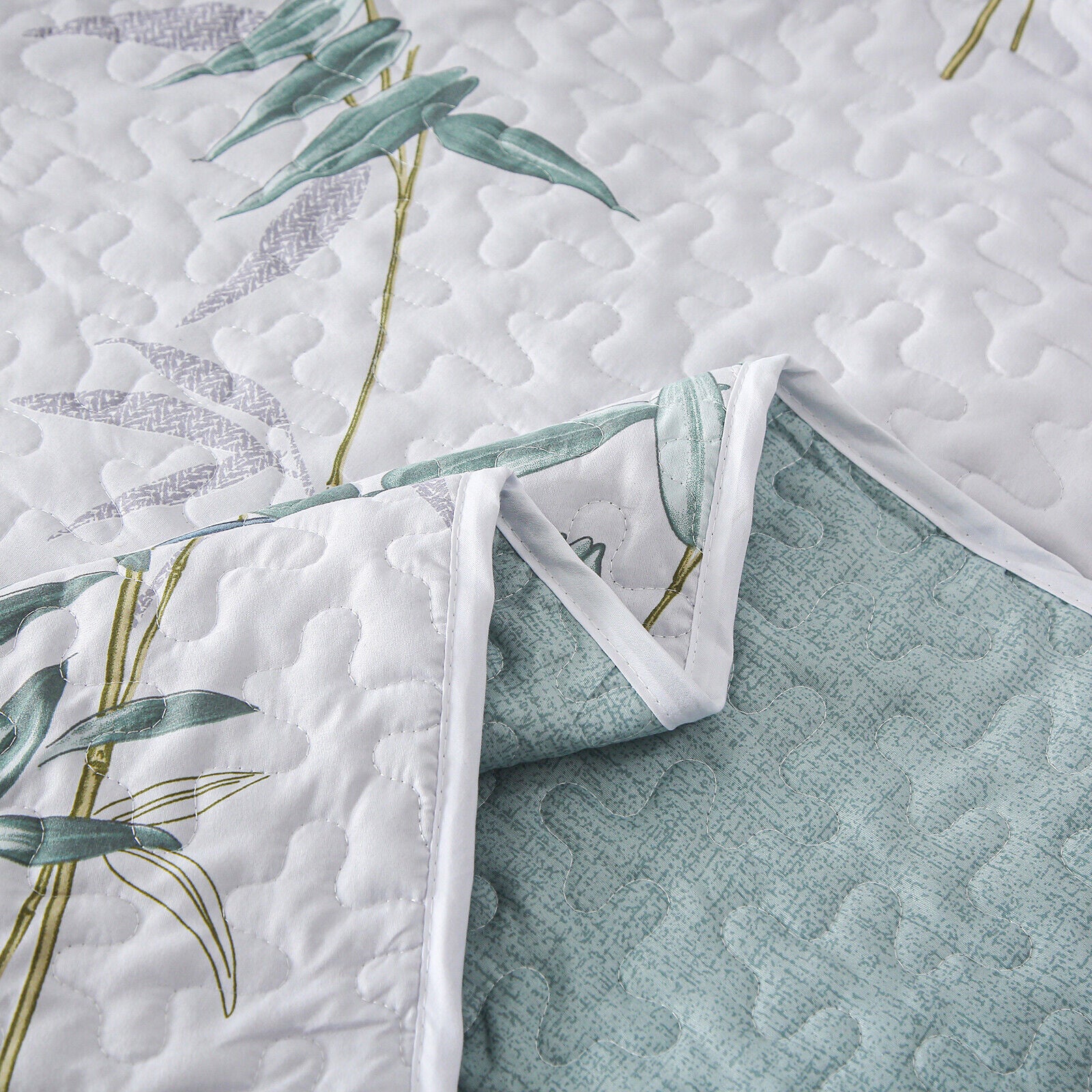 Soft leafey bloom Quilted 3 Pc Bedspread & Pillow Cover Set with botanical pattern and textured stitching on white and blue fabric