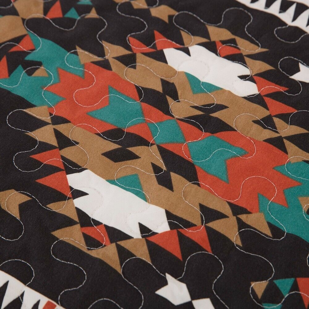 Close-up of geometric patterned fabric in black, brown, teal, and orange from Wow elegent Sunset Daisy 3 Pc Bedspread & Pillow Cover Set