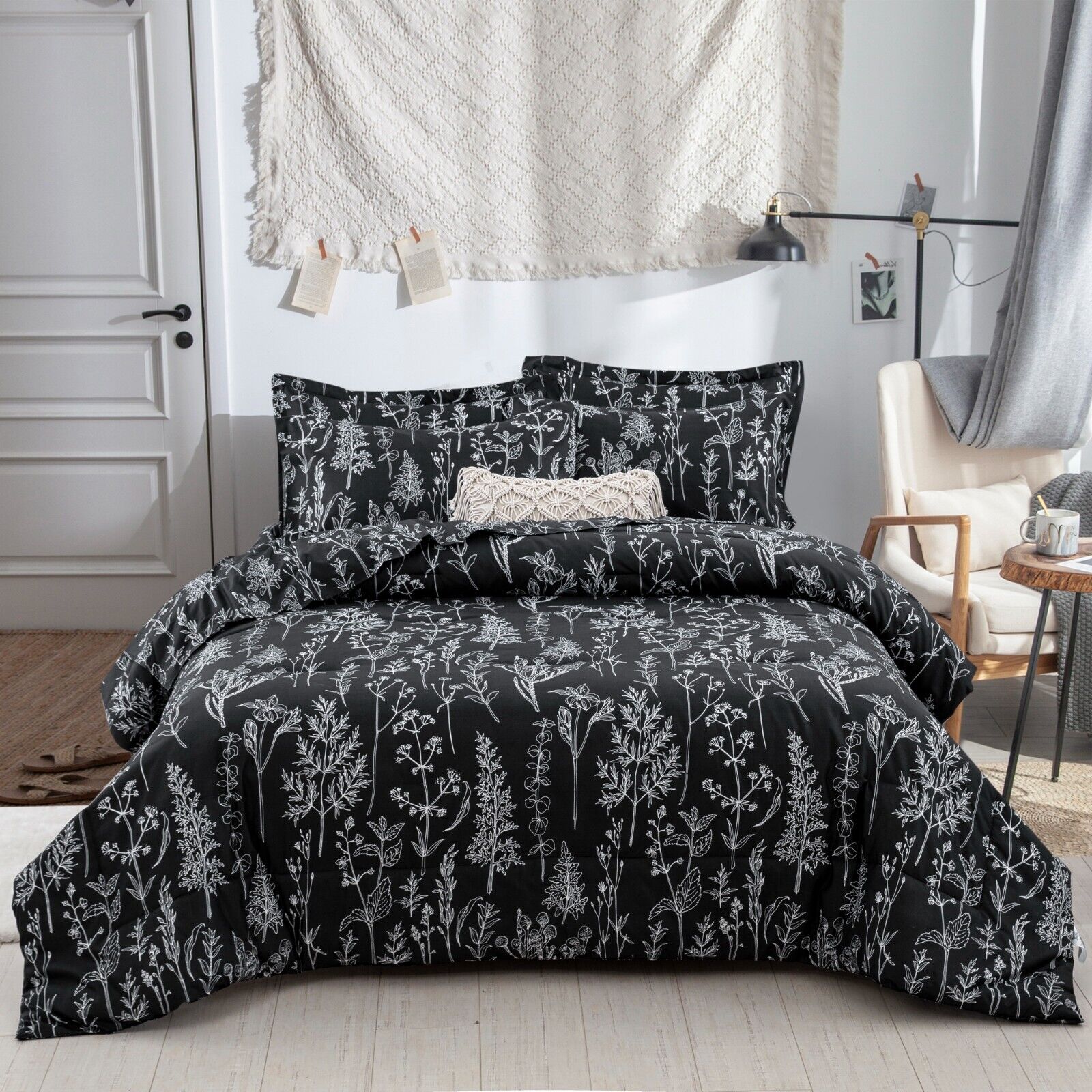Floral Leaves Comforter Set, Queen Size, Microfiber Quilted Bedding with Pillowcase in black with white floral pattern on bed in cozy room