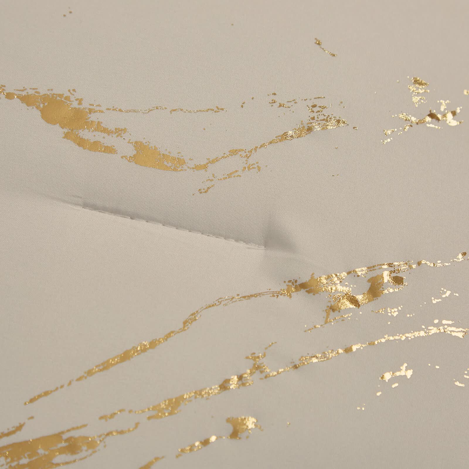 Close-up of gold metallic accents on fabric from Coastal Drift apricot Comforter Bundle – Breezy 3‑Piece Bedding