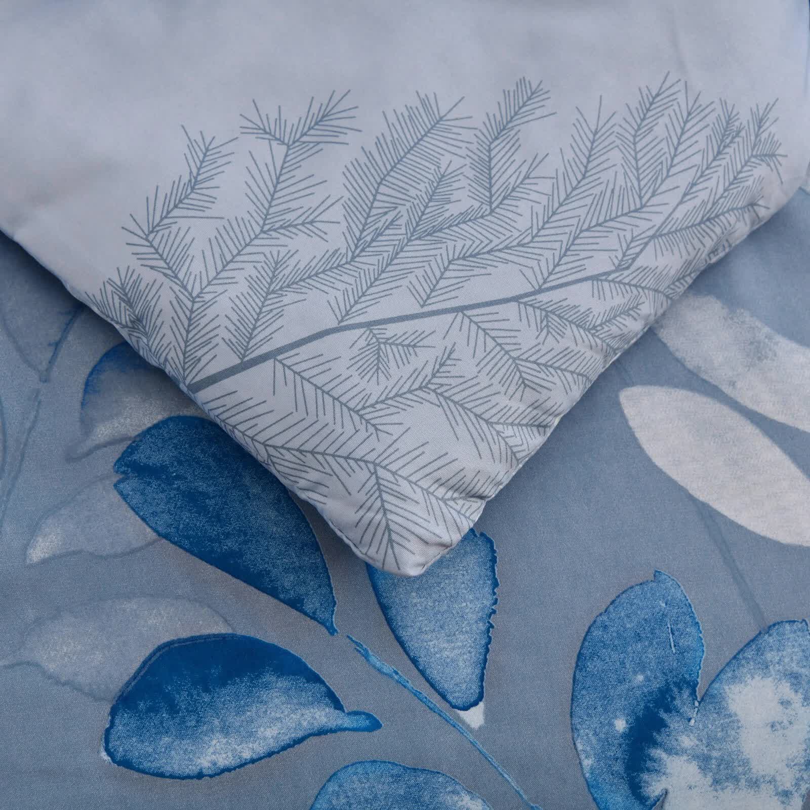 Close-up of blue and gray leaf patterned fabric on GlowUp Bedroom Comforter – 3‑Piece Insta‑Aesthetic Set from Bedzy