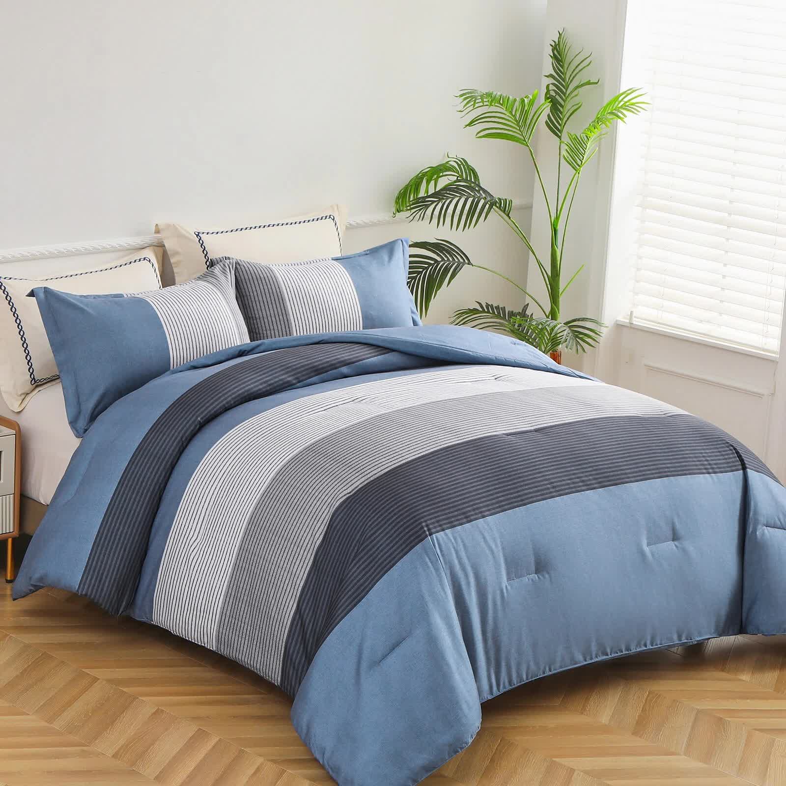 Coastal Drift striped Comforter Bundle – Breezy 3‑Piece Bedding set on bed with blue, gray, and white stripes in bedroom scene