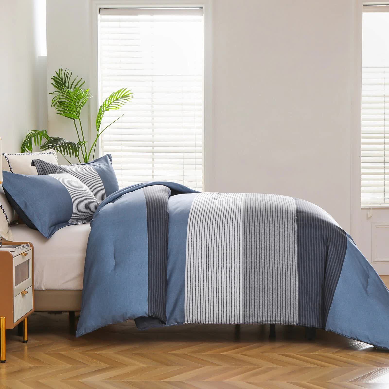 Coastal Drift striped Comforter Bundle – Breezy 3‑Piece Bedding in blue and gray stripes on bed with pillows in bright bedroom