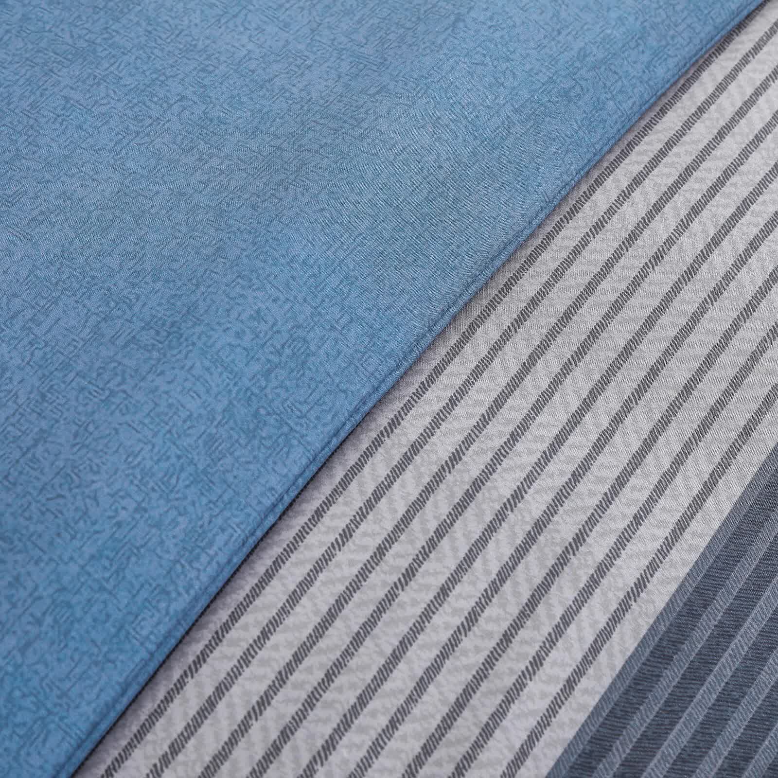 Coastal Drift striped Comforter Bundle – Breezy 3‑Piece Bedding with textured blue and striped gray fabric detail close-up