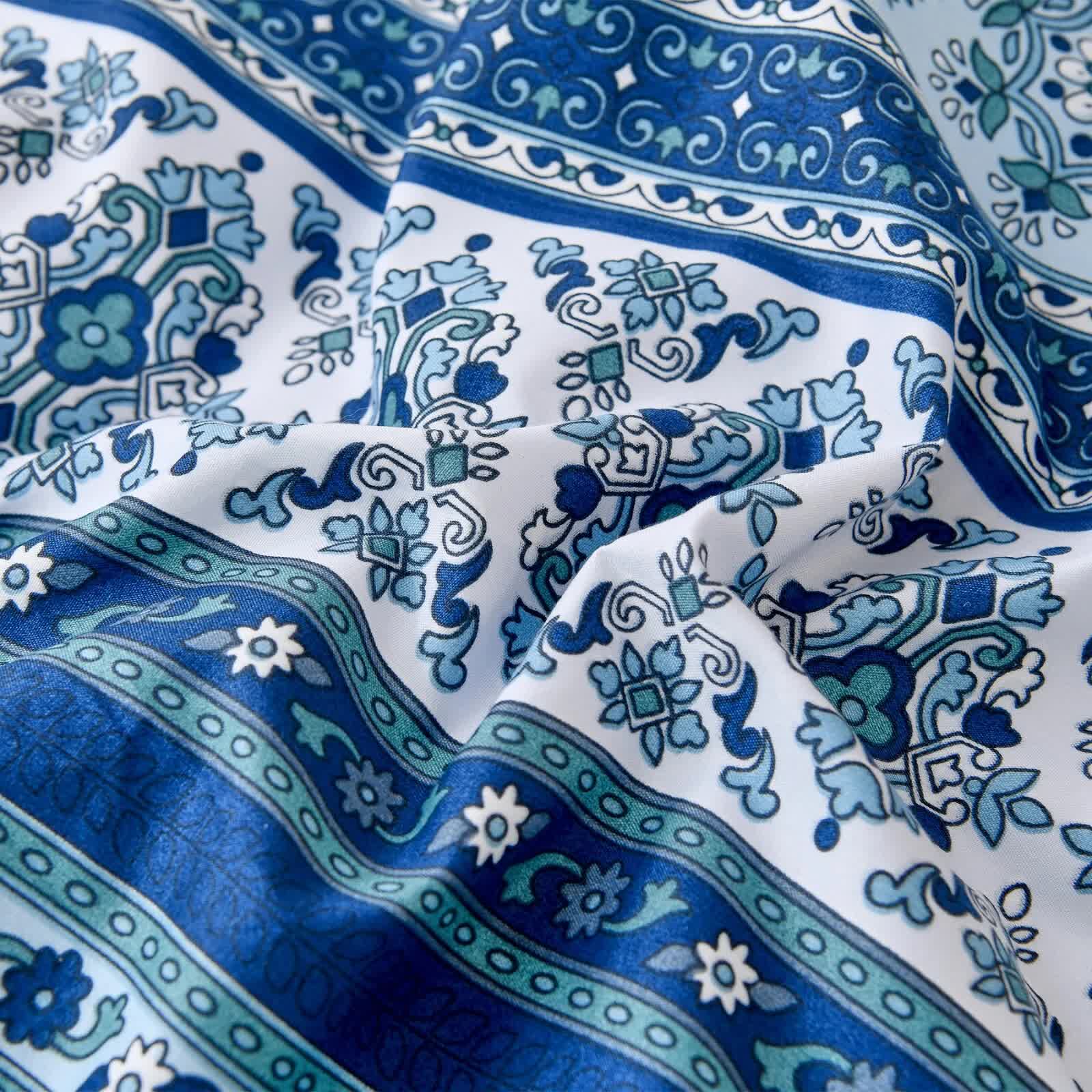 Close-up of patterned fabric from the Boho Vibes blue Bedding Set – 3‑Piece Comforter & Pillow Covers showing intricate blue and teal designs