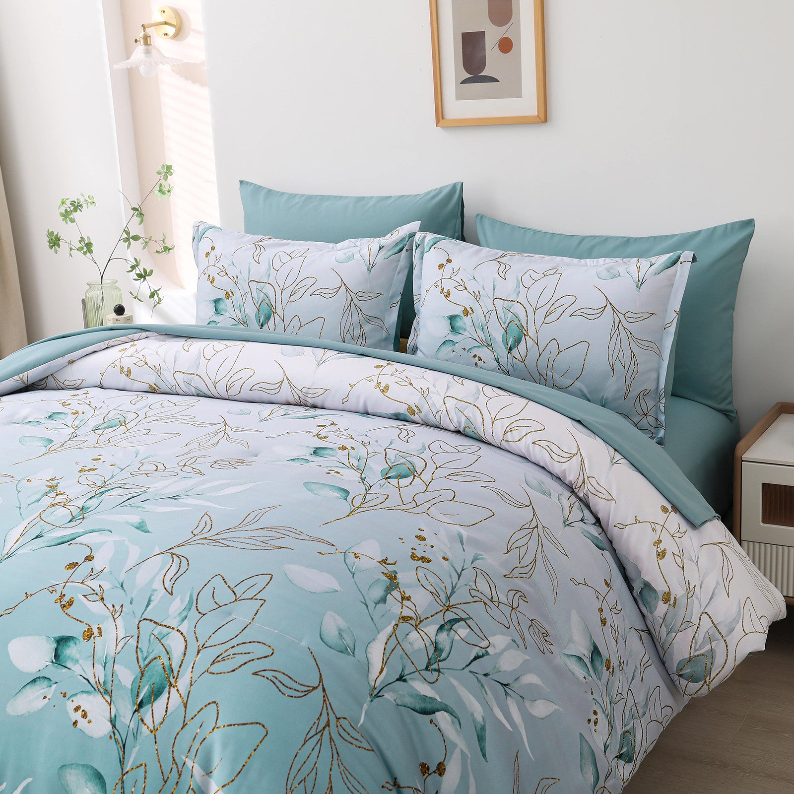 Soft Floral Leaf Comforter Set, King Size, Quilted Cozy Bedding with Pillowcases in blue and white floral design on bedzy bed
