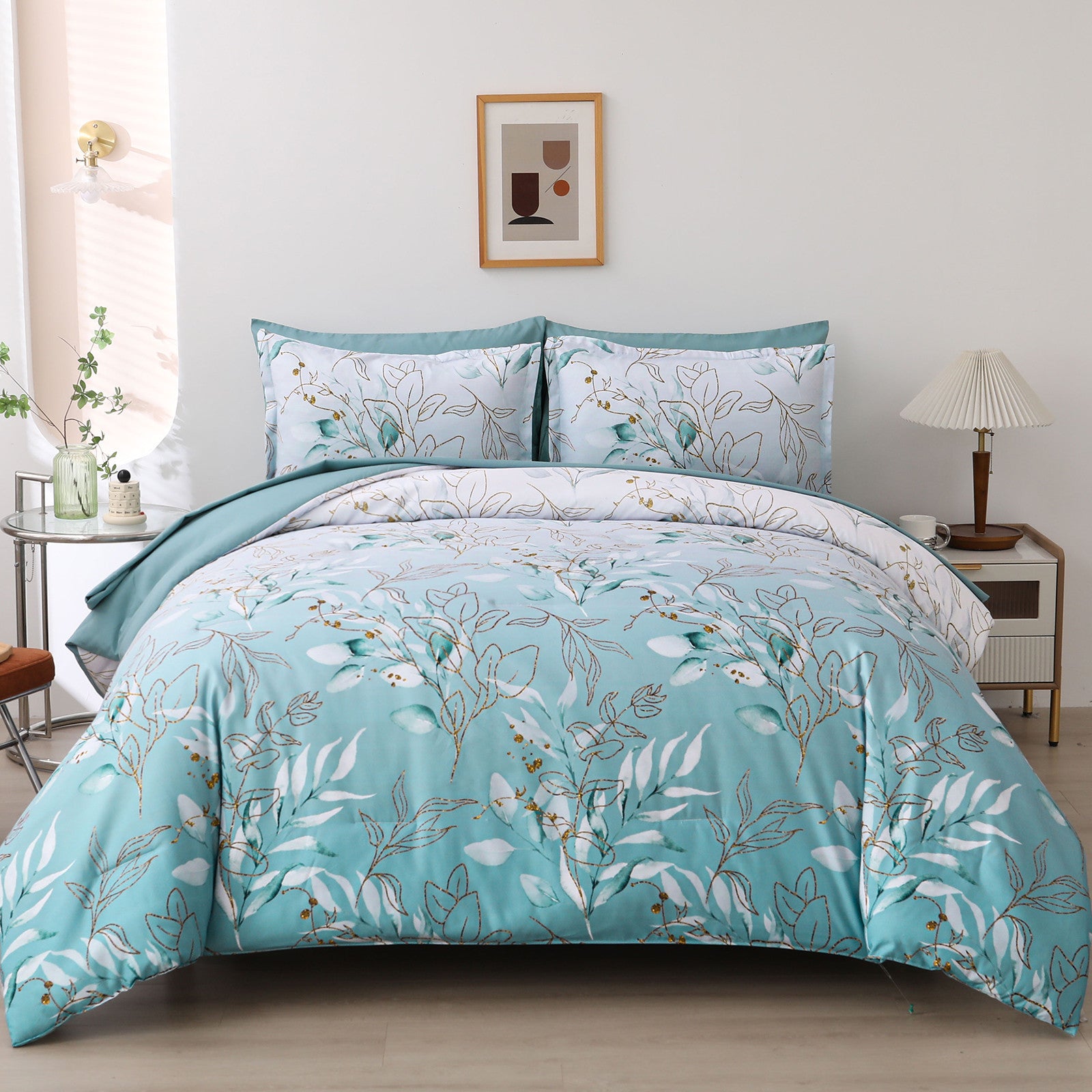 Soft Floral Leaf Comforter Set, King Size, Quilted Cozy Bedding with Pillowcases in blue floral print on bed with bedside tables