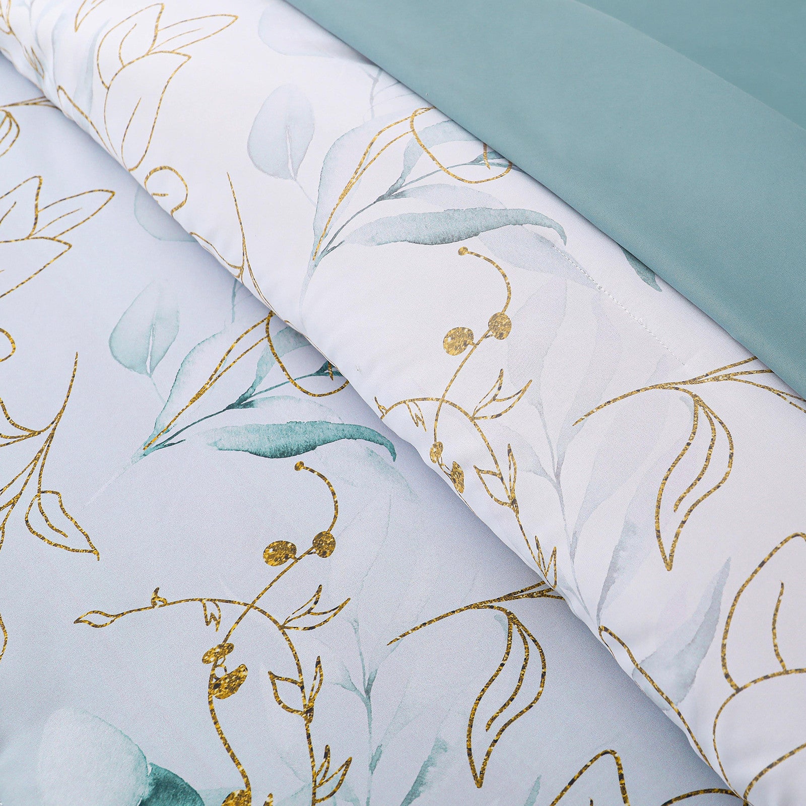Soft Floral Leaf Comforter Set, King Size, Quilted Cozy Bedding with Pillowcases showing floral pattern and teal fabric detail