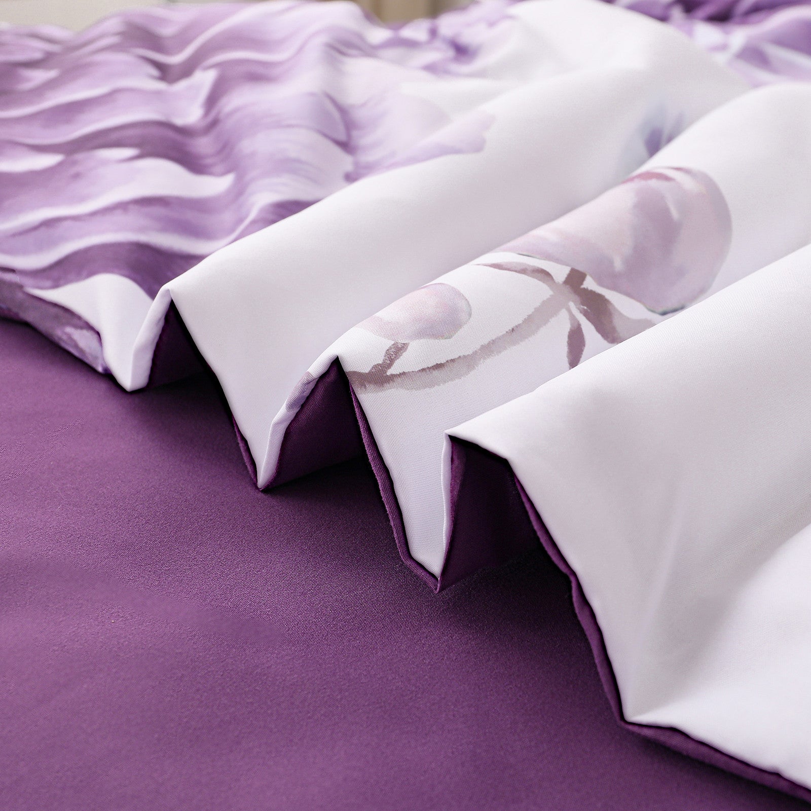 Close-up of Elegant Floral Comforter Set, King Size, Warm Quilted Bedding with Pillowcases in soft purple floral design on bedzy bed