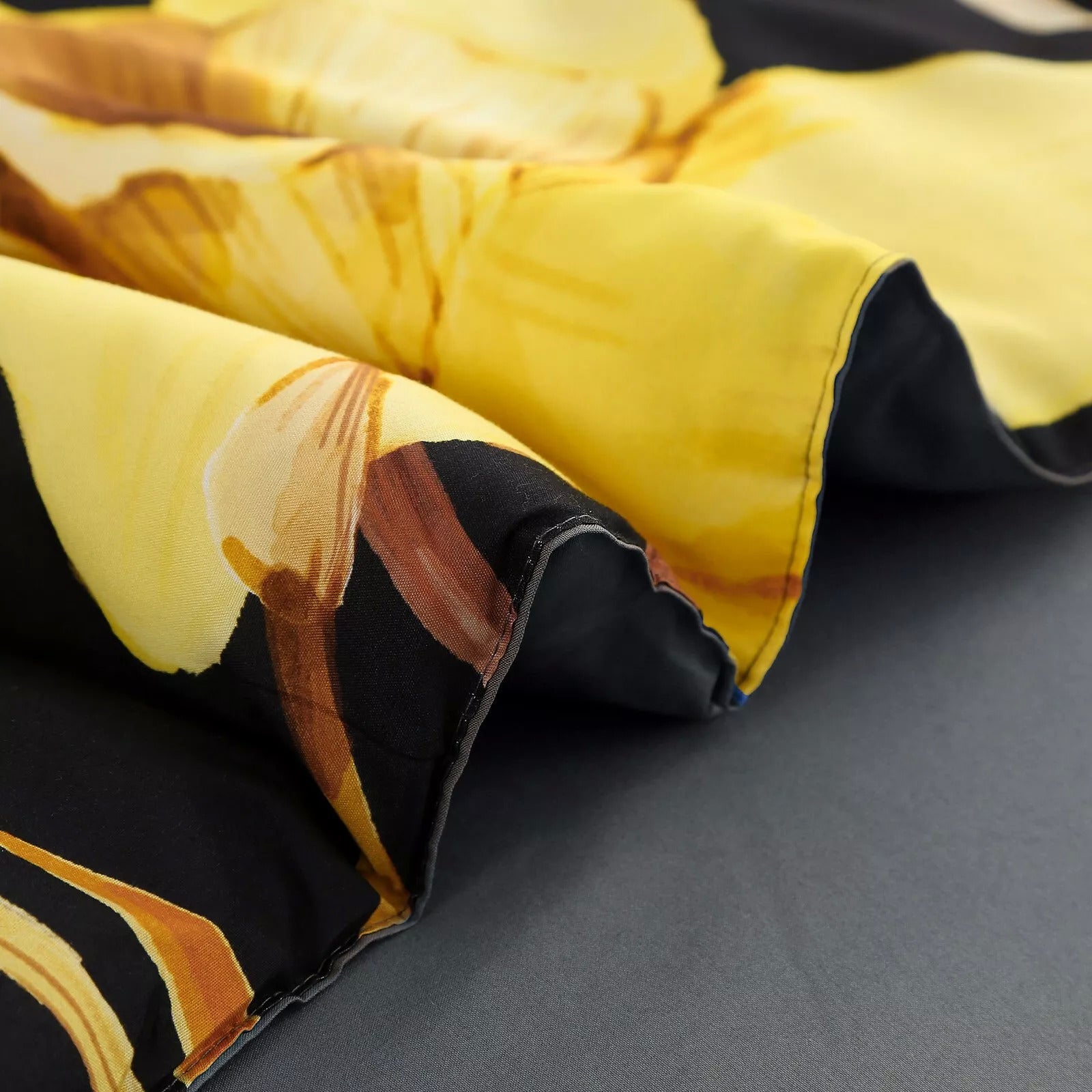Soft Floral Leaf Comforter Set, King Size, Quilted Bedding with Pillowcases featuring yellow and brown floral pattern on black background