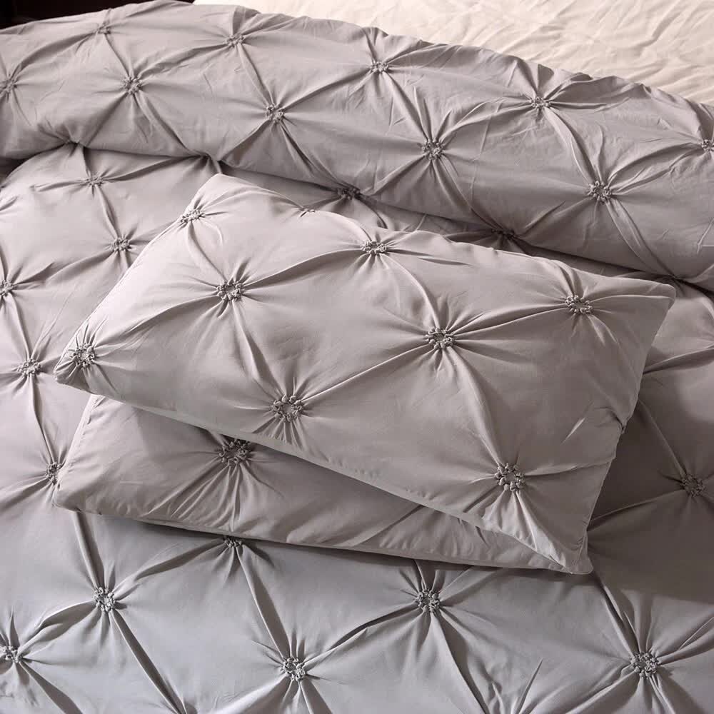 Chill Vibe Bedding Set – 3‑Piece Comforter with Pillow Shams in soft gray with textured tufted design on bed set