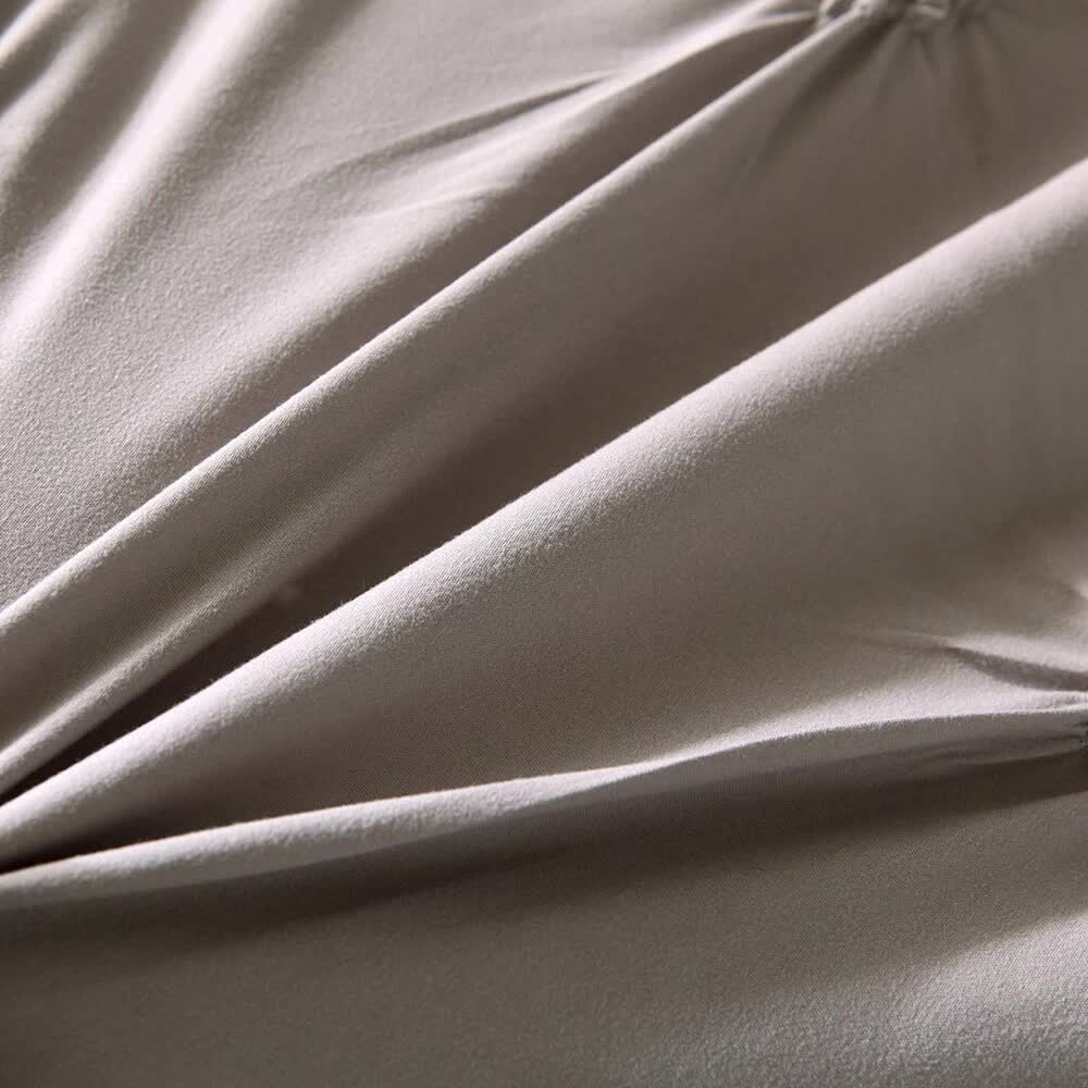 Close-up texture of soft beige fabric from the Chill Vibe Bedding Set – 3‑Piece Comforter with Pillow Shams