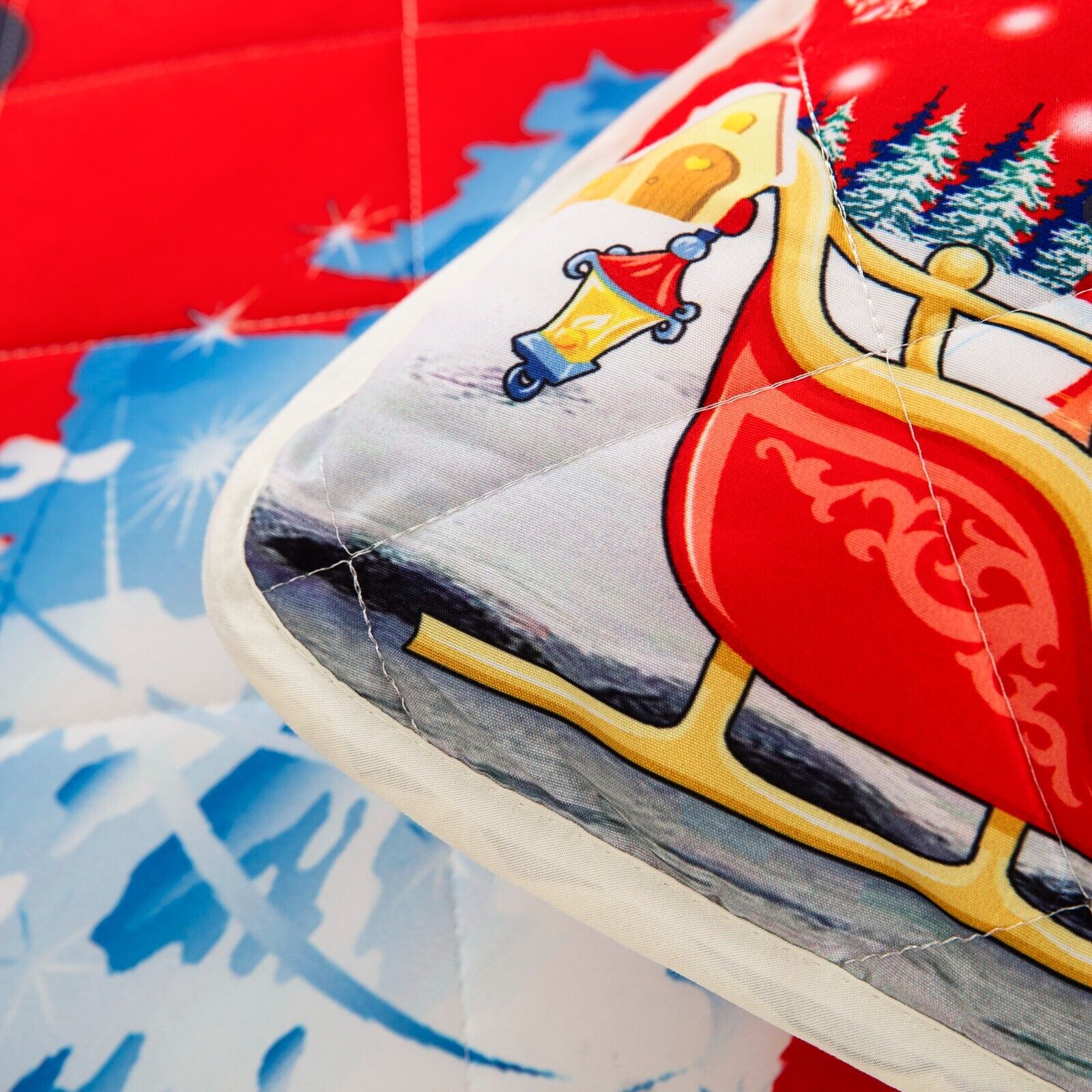 Close-up of Holiday Cheer Christmas Queen Bedspread Set featuring quilted festive sleigh and winter scene design