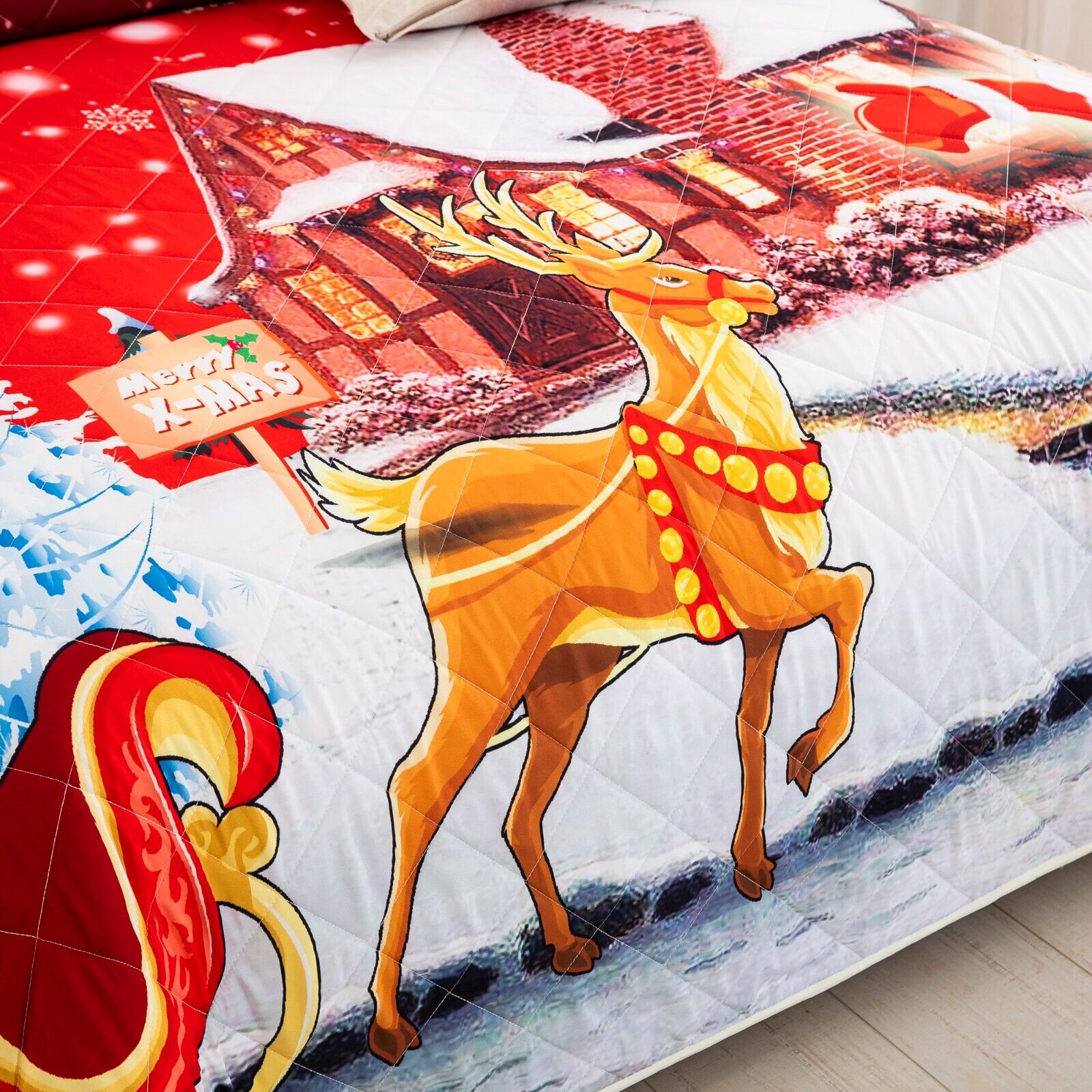 Close-up of Holiday Cheer Christmas Queen Bedspread Set featuring a festive reindeer and snowy cottage design