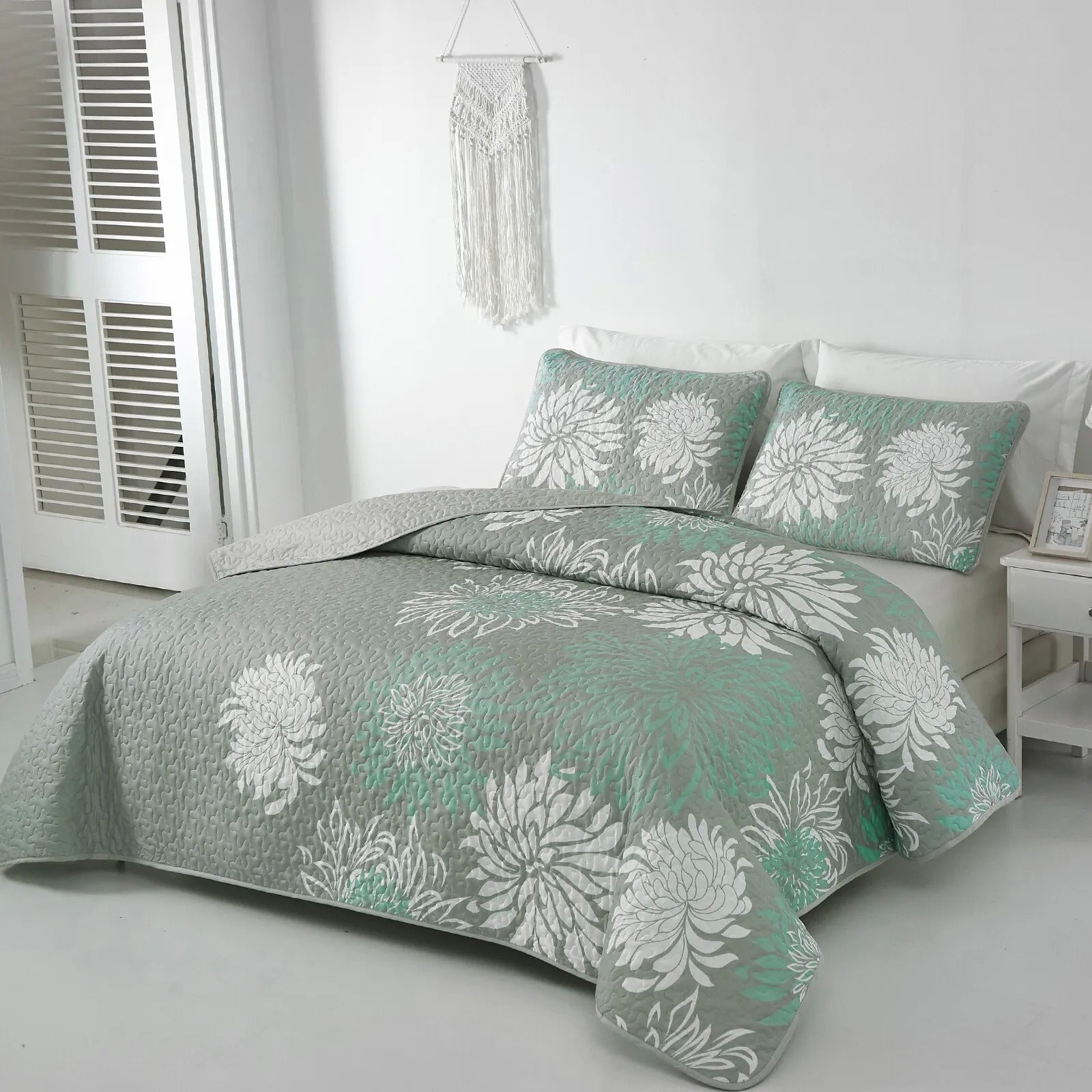 Elegant Quilted Bedspread and Pillowcases Set: Infuse Your Bedroom with Charm - Queen size with floral pattern on bed in modern bedroom