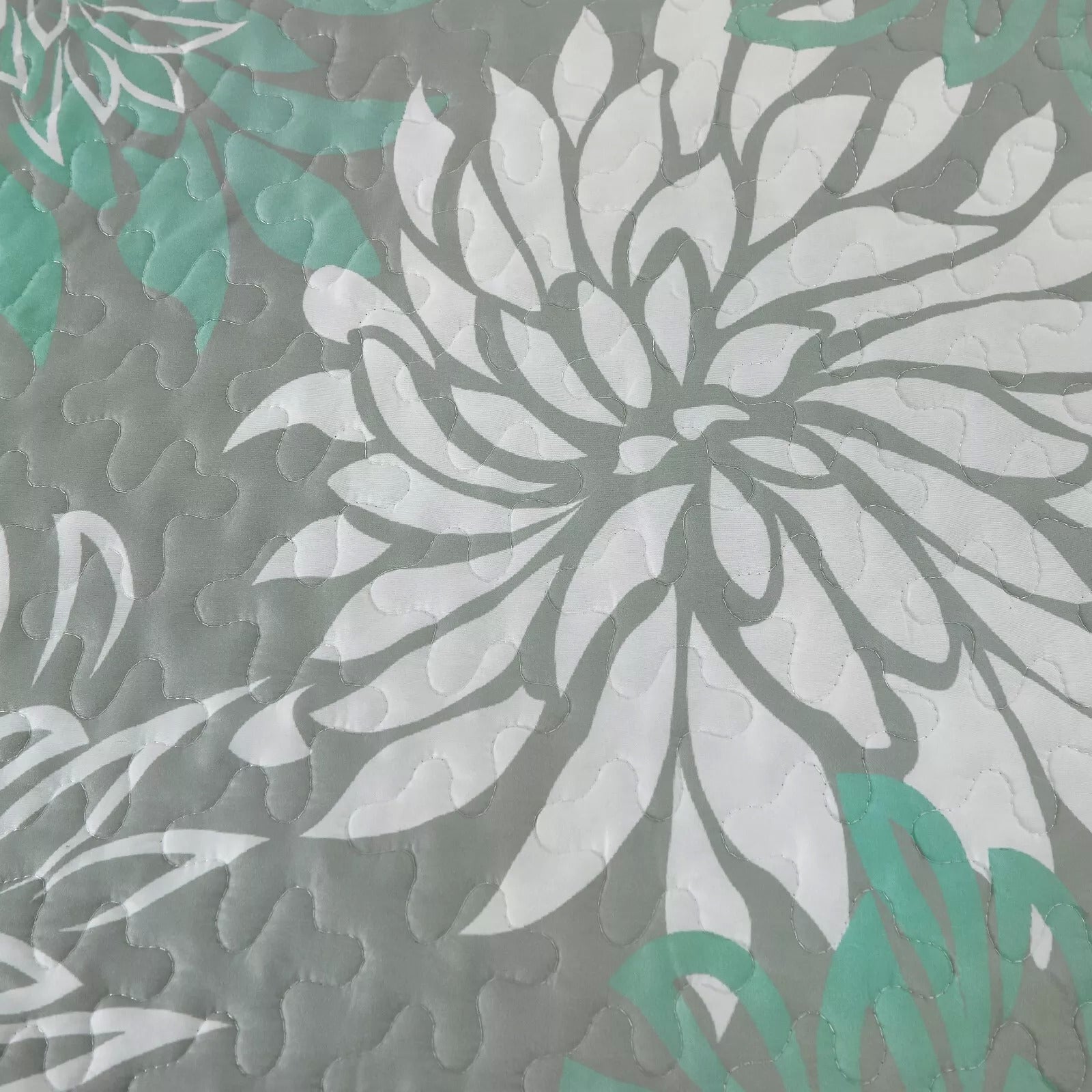 Close-up of floral quilted fabric on Elegant Quilted Bedspread and Pillowcases Set: Infuse Your Bedroom with Charm - Queen size