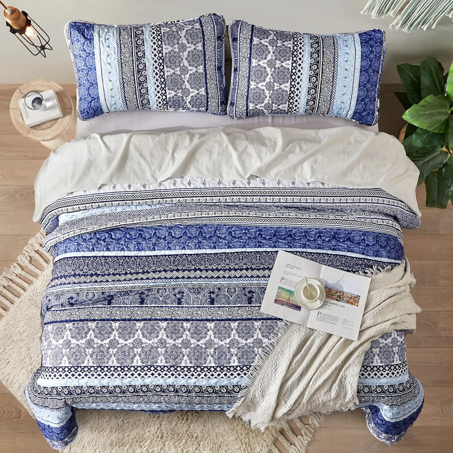 Sophisticated Quilted Coverlet and Pillowcases Set: A Timeless Addition - Queen size with blue patterned quilt and pillows on bed
