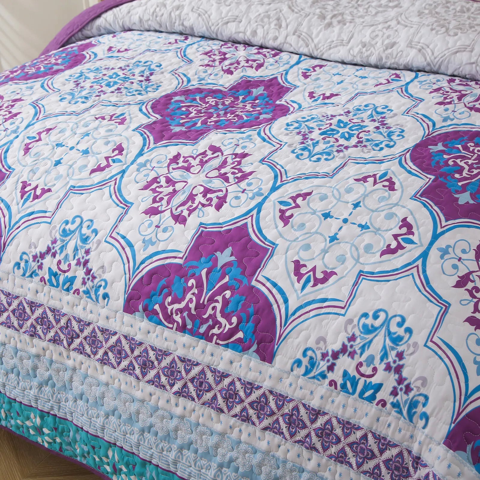 Handsome Quilted Bedspread and Pillowcases Set: Strong, Sturdy, and Stylish - Queen size with intricate purple and blue patterns