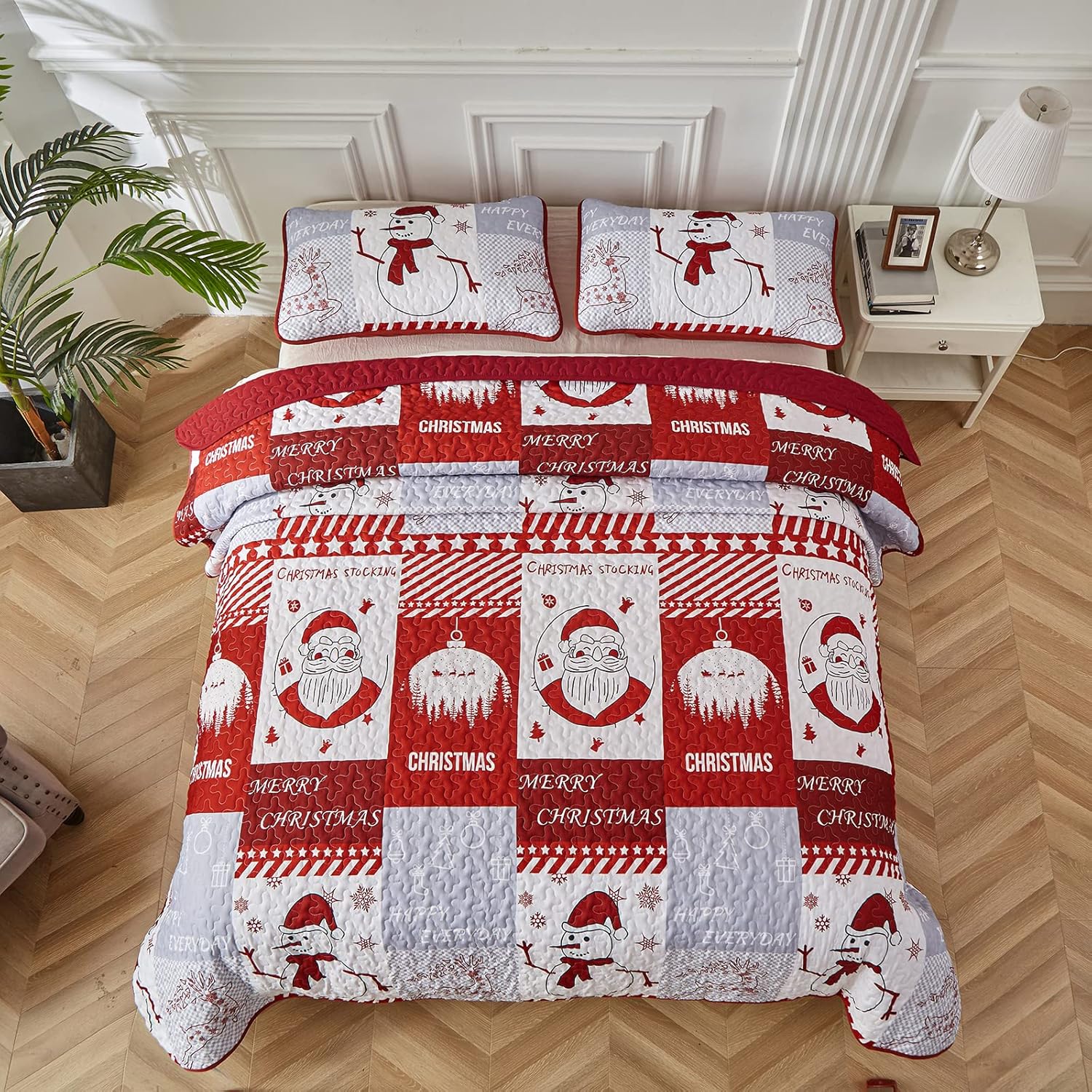 Winter Wonderland snowman santa Christmas Queen Bedspread Set with festive quilted design on bed in cozy bedroom setting