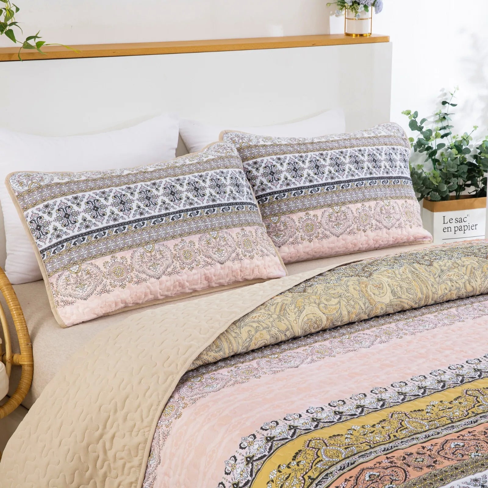 Crafted Quilted Bedspread and Pillowcases Set: A Testament to Skilled Craftsmanship - Queen size in soft pastel tones on bed