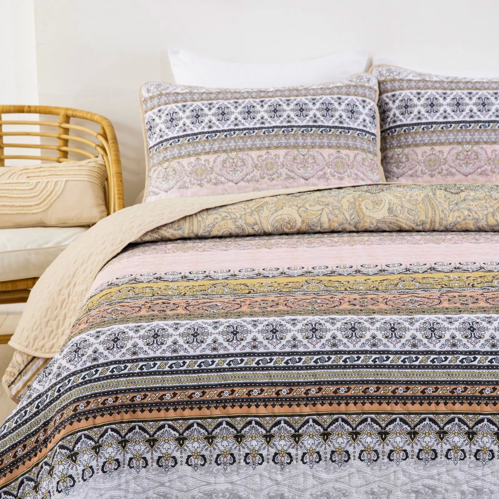 Crafted Quilted Bedspread and Pillowcases Set: A Testament to Skilled Craftsmanship - Queen size with ornate patterns on bed in cozy bedroom