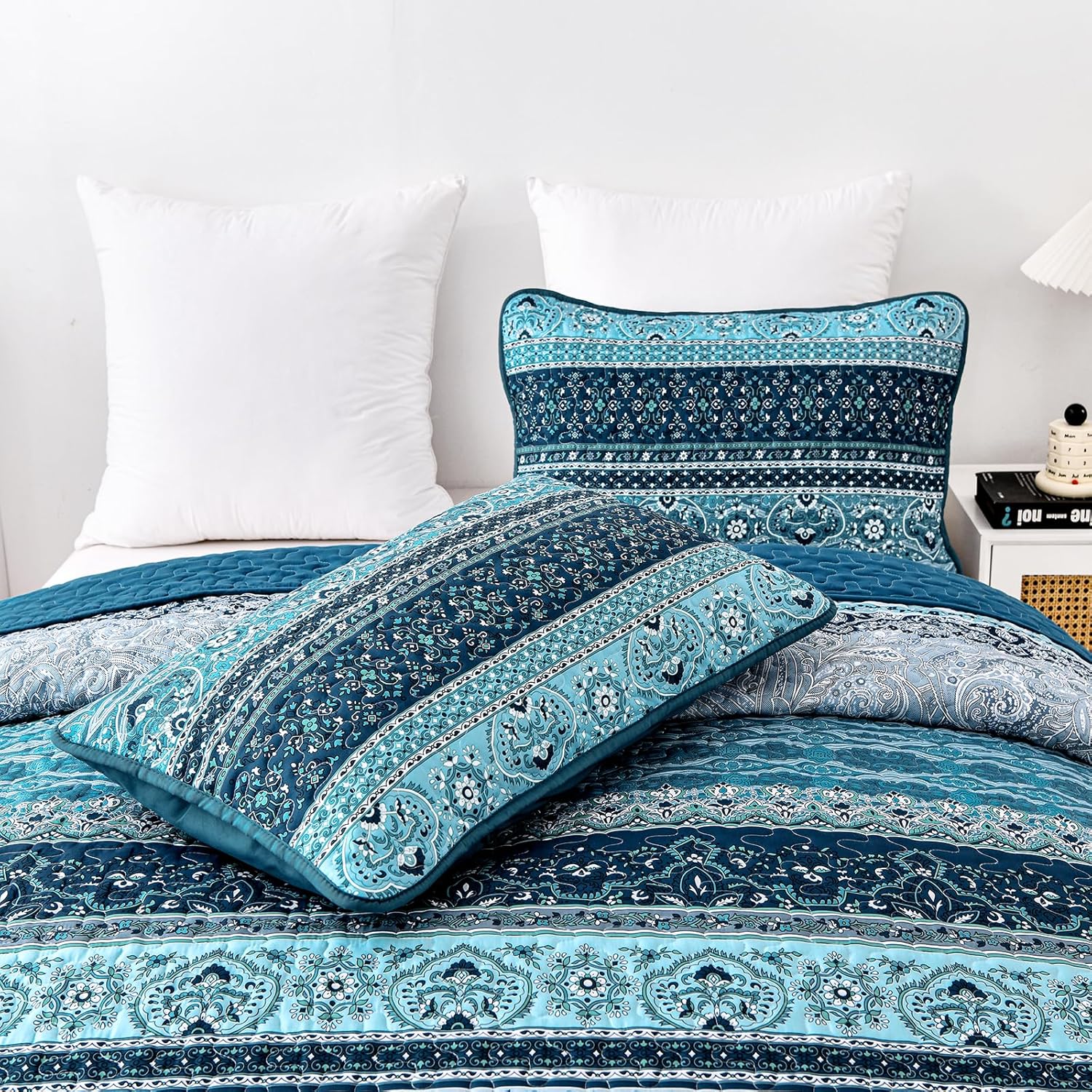 Opalescent Quilted coverlet and pillowcovers set: Shimmering Beauty - Queen size in blue patterned design on a bed in bedroom furniture setting