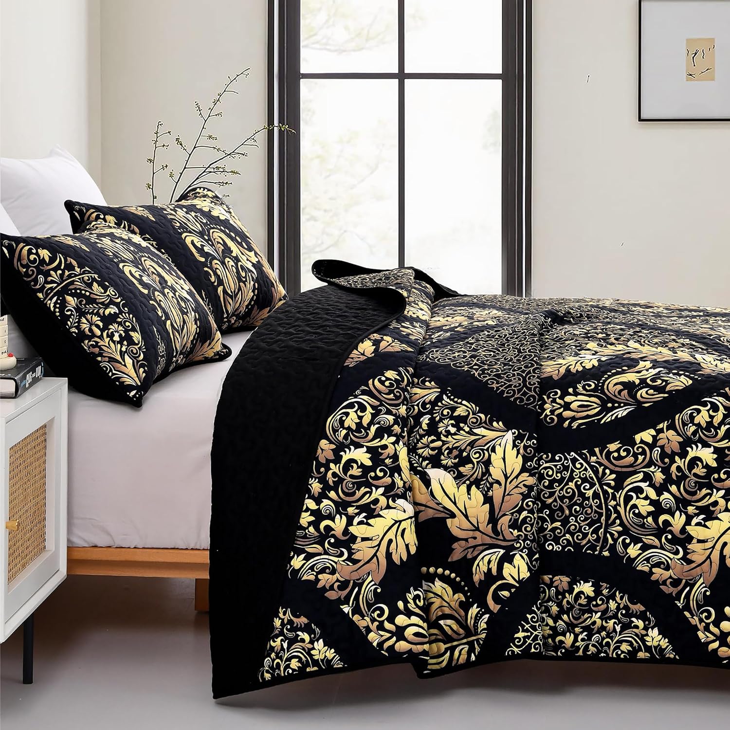 Luminous Quilted Coverlet and Pillowcases Set: Brighten Your Bedroom Atmosphere - Queen size with black and gold floral design on bed