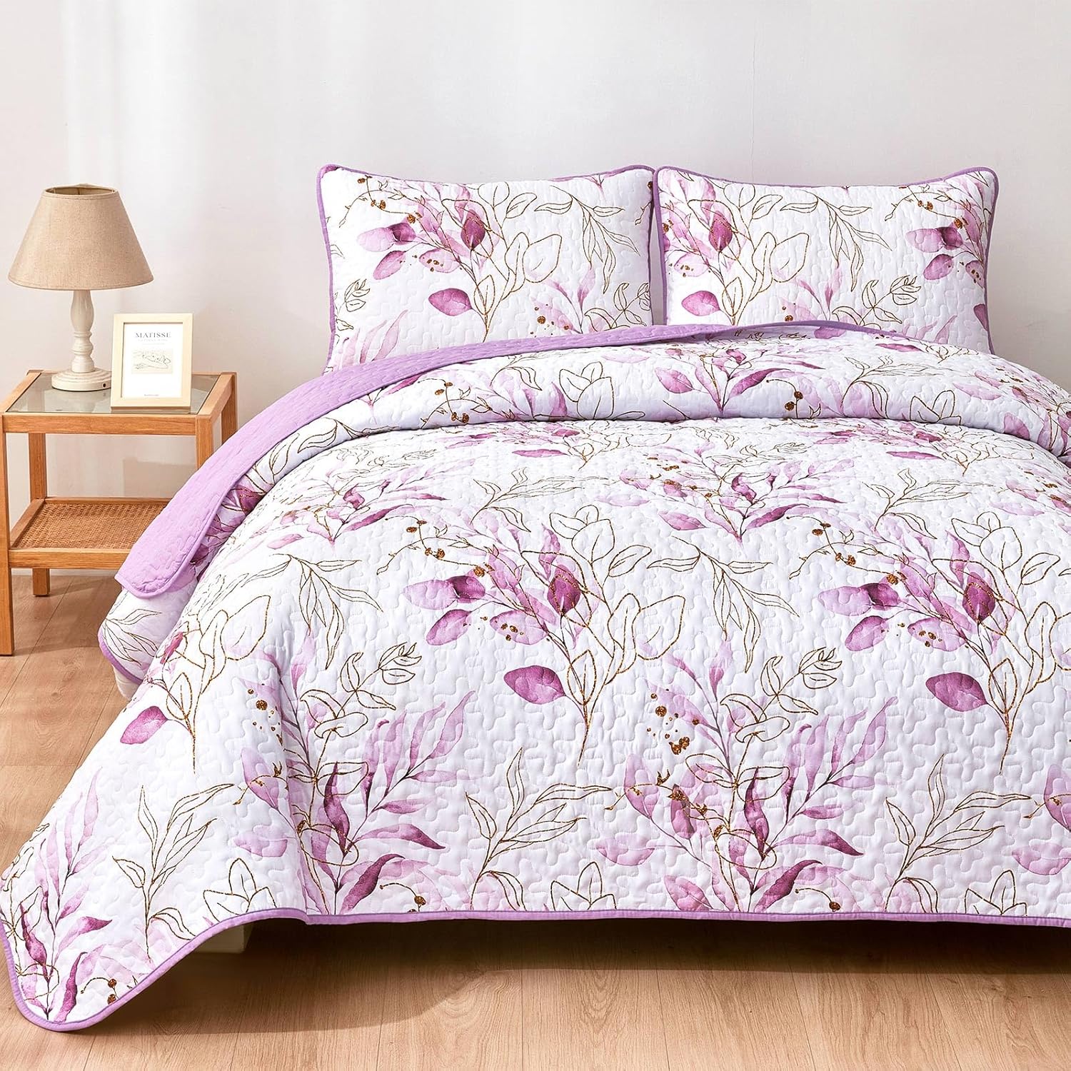 Unique Quilted bedspread and pillowcovers set: Stand Out in Style - Queen size with floral pattern on a made bed in bedroom setting
