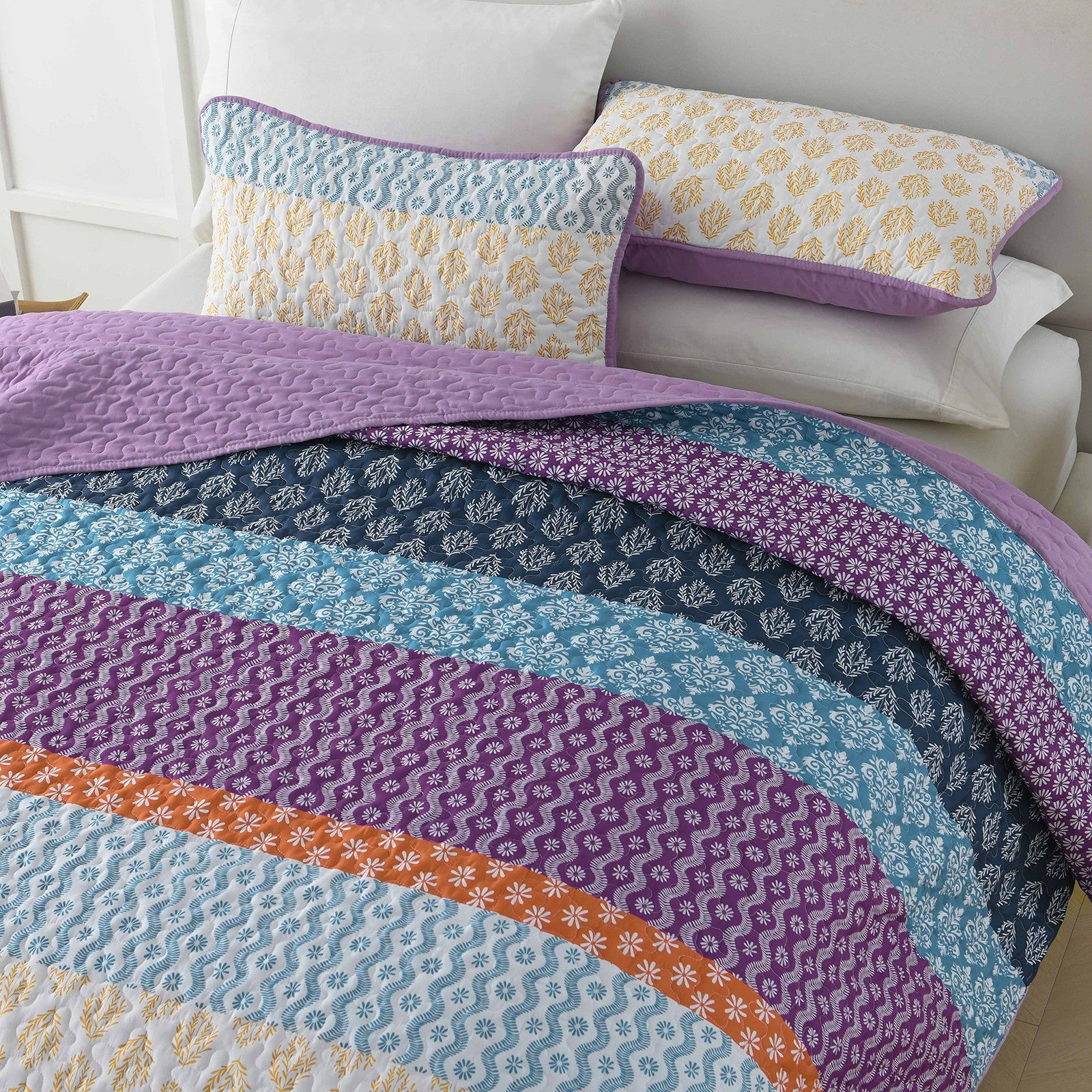 Quirky Quilted coverlet and pillowcovers set: Add Personality to Your Space - Queen size with colorful patterns on bedzy bed