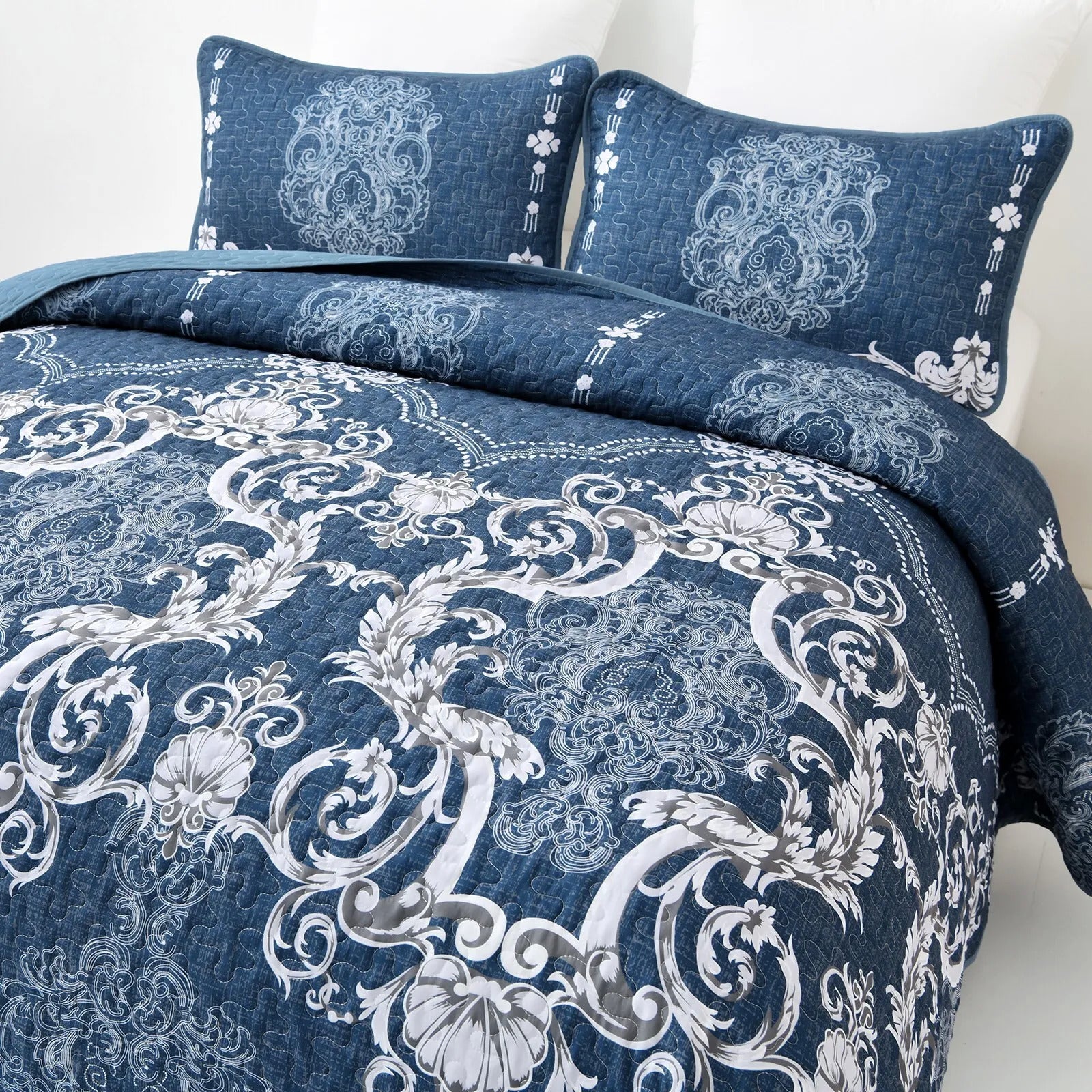 Alluring Quilted bedspread and pillowcovers set: Luxurious Bedroom Addition - Queen size in blue with ornate white pattern