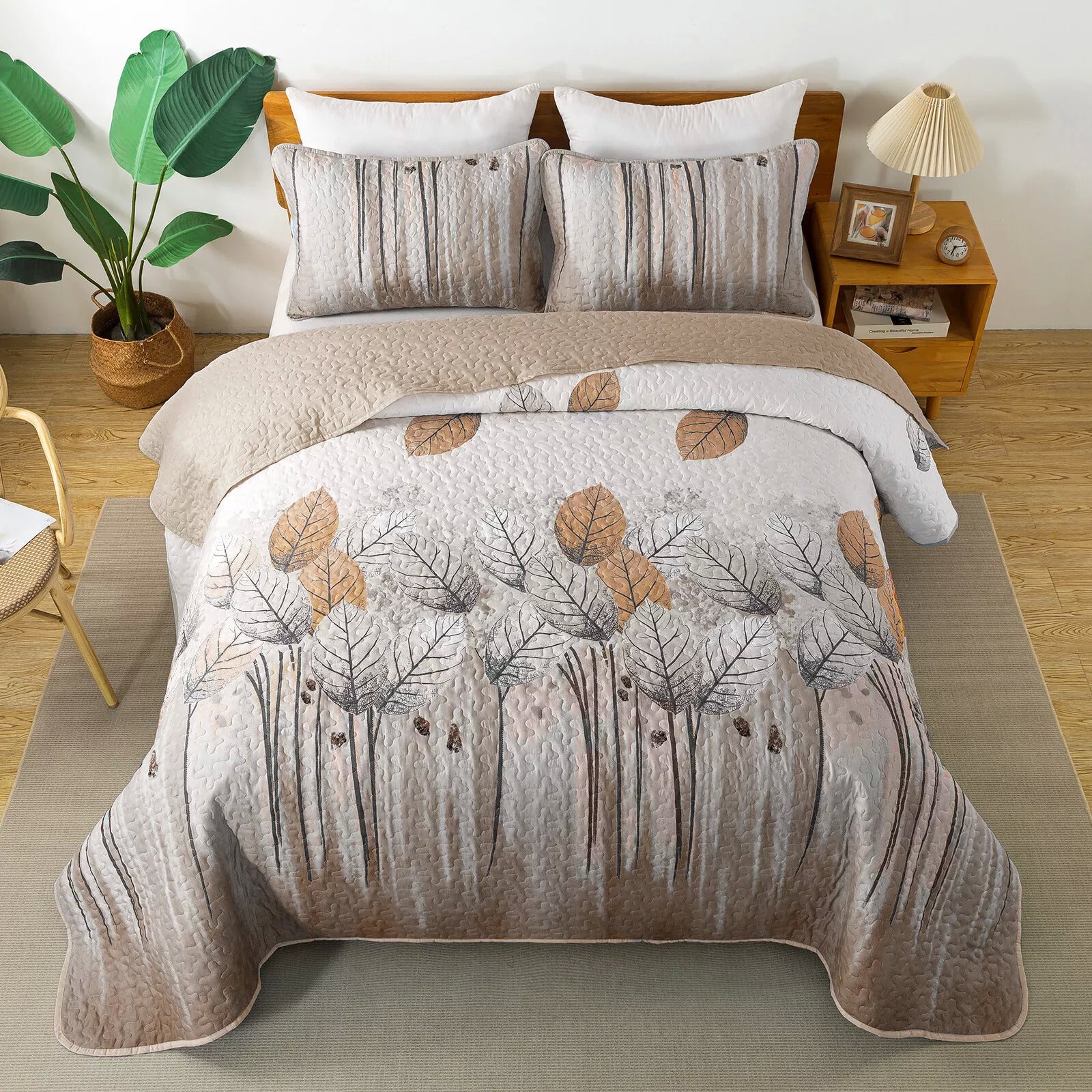 Kaleidoscope Quilted bedspread and pillowcovers set: Vibrant and Fun - Queen size with nature-inspired leaf pattern on bed in bedroom setting